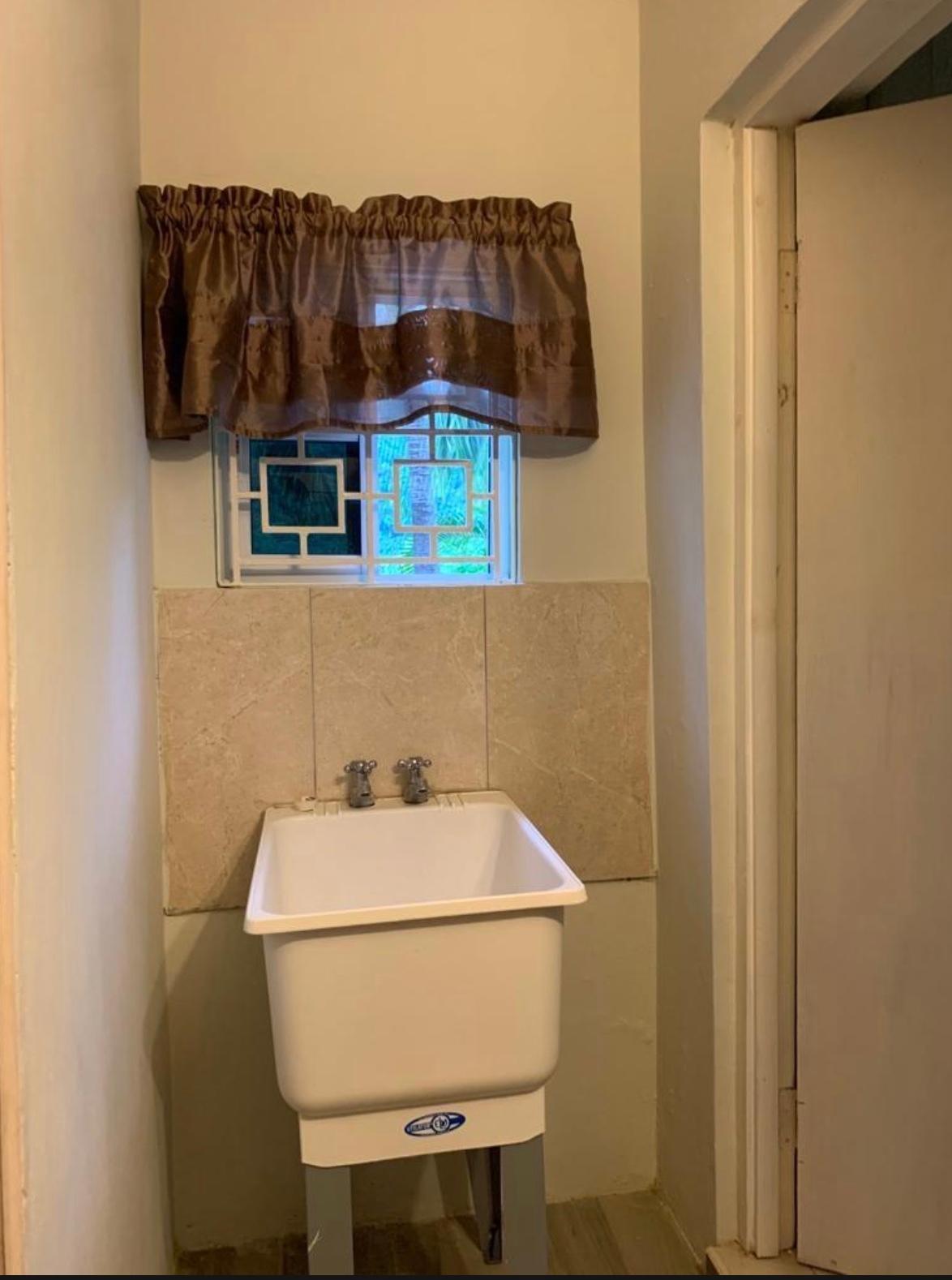 Charming-2-Bedroom-Flat-for-Rent-in-Havendale-St.-Andrew Eighteenth image of 22 Belgrade Loop in Kingston 8, St. Andrew, Jamaica - property is For Rent