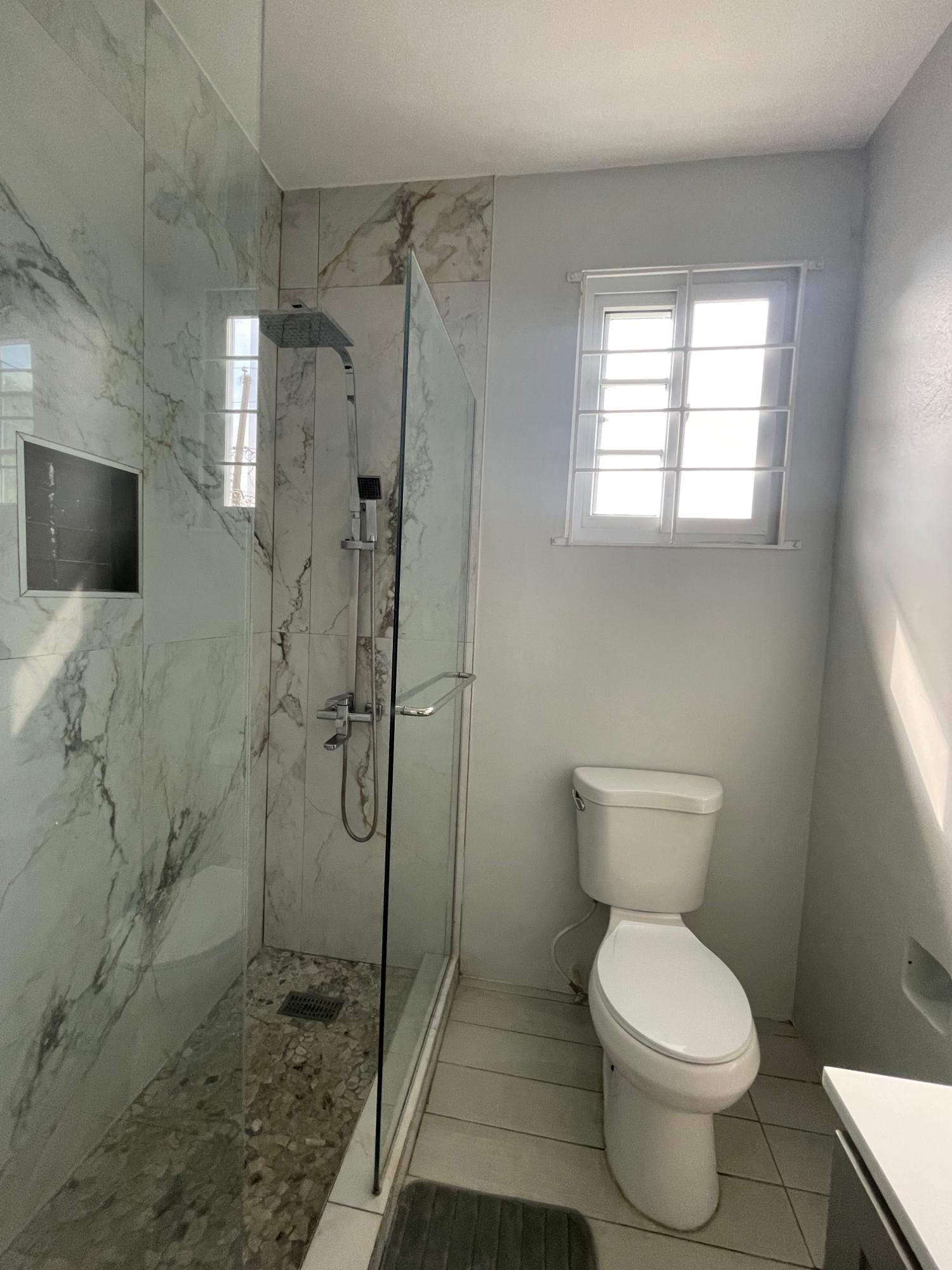 Charming-3-Bedroom-House-for-Rent-in-Mona-St.-Andrew Thirteenth image of 21 Anthurium Drive in Kingston 8, St. Andrew, Jamaica - property is For Rent