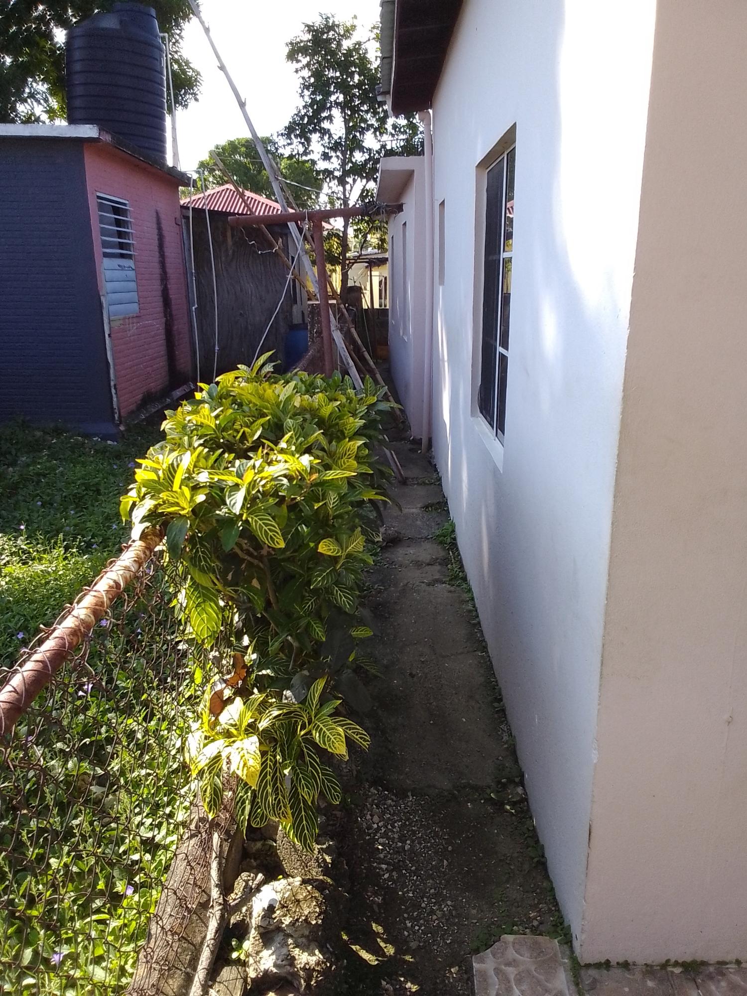 Charming-House-for-Sale-in-Clarendon-Jamaica-Lot-34-Tulip-Ave Second image of Lot 34 Tulip Ave in May Pen, Clarendon, Jamaica - property is For Sale