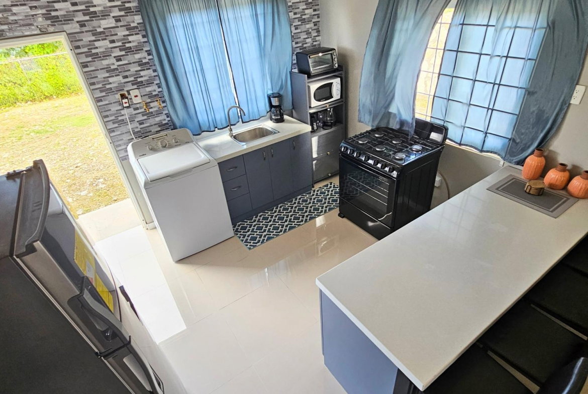 Sixteenth image of 178 Edmund Ridge Estate in Rose Hall, St. James, Jamaica - property is For Rent