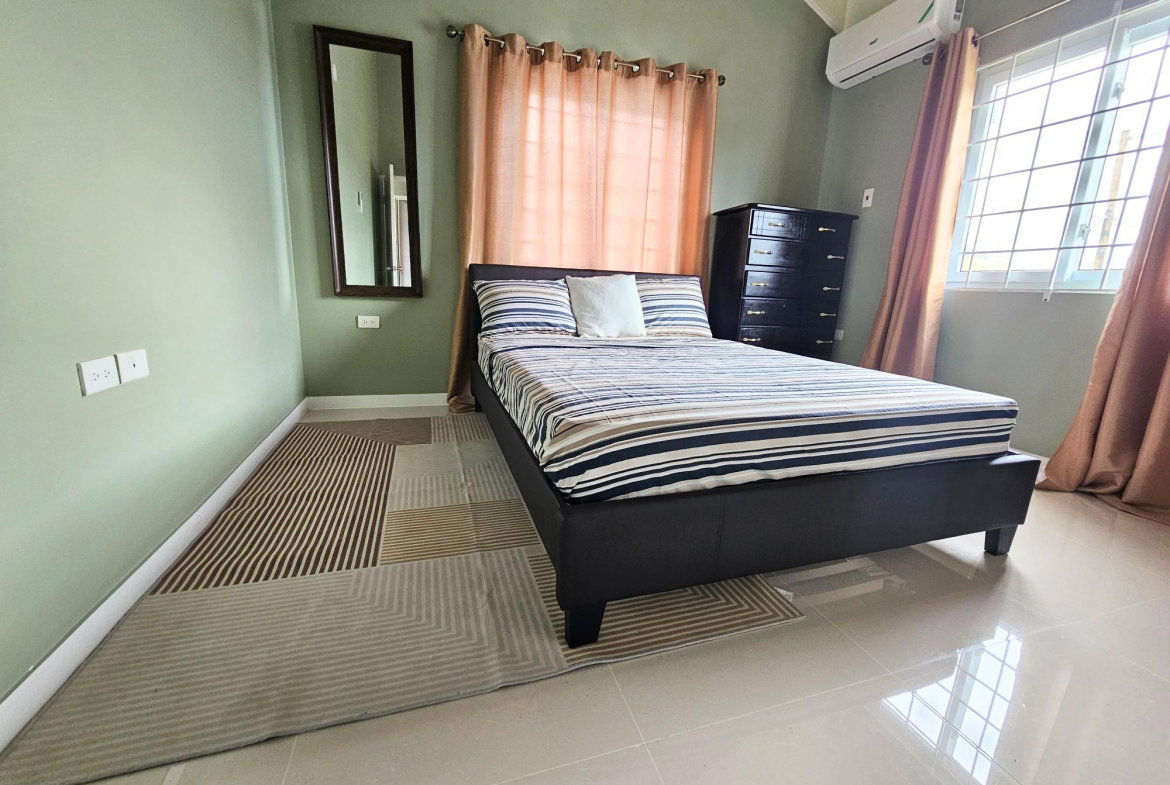 Sixth image of 178 Edmund Ridge Estate in Rose Hall, St. James, Jamaica - property is For Rent