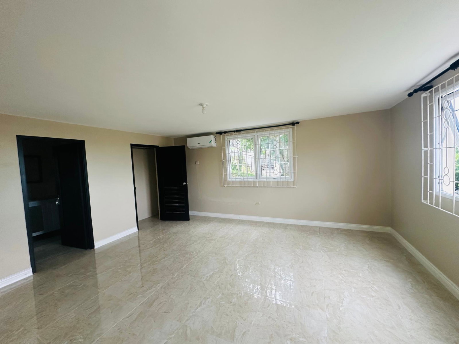 Modern-Studio-Apartment-for-Rent-in-St.-James-Jamaica First image of 1-28 Lagoon View Walk in Bogue, St. James, Jamaica - property is For Rent