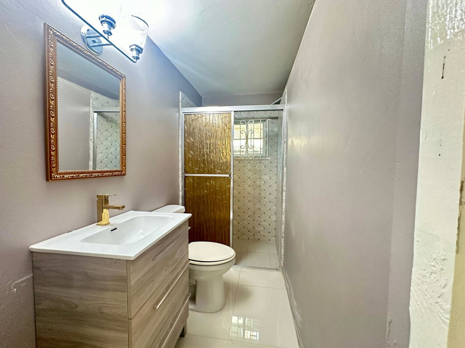 Spacious-2-Bedroom-Apartment-for-Rent-in-Northern-Estates-St.-James Twelfth image of A-565 Block 14, Part of Norther in Lilliput, St. James, Jamaica - property is For Rent