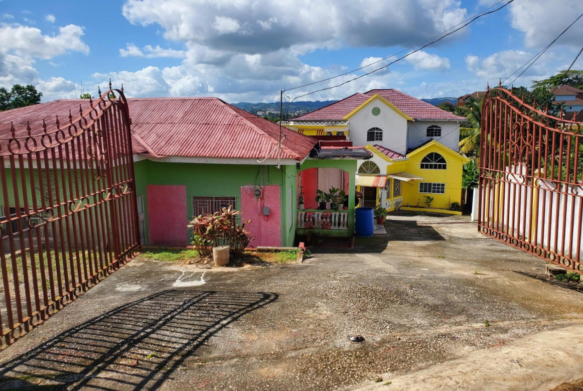 First image of East Ingleside Road in East Ingleside Gaedens, Manchester, Jamaica - property is For Sale