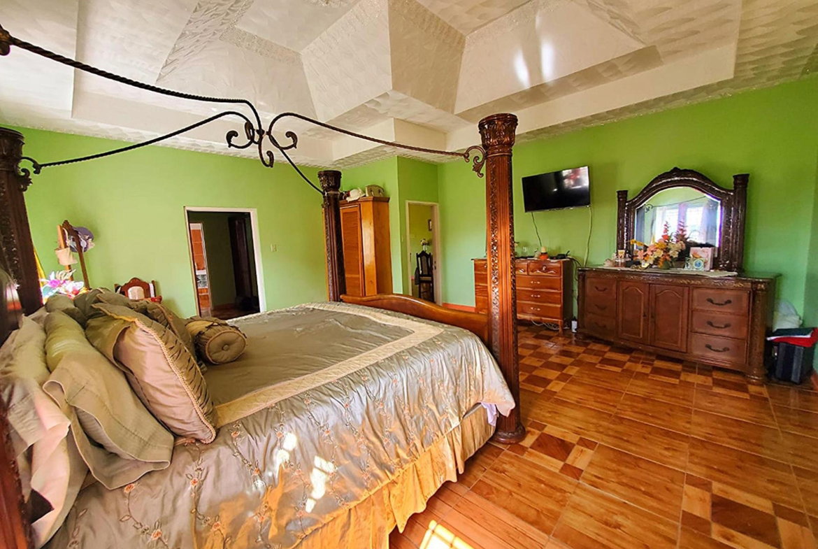 Thirteenth image of East Ingleside Road in East Ingleside Gaedens, Manchester, Jamaica - property is For Sale