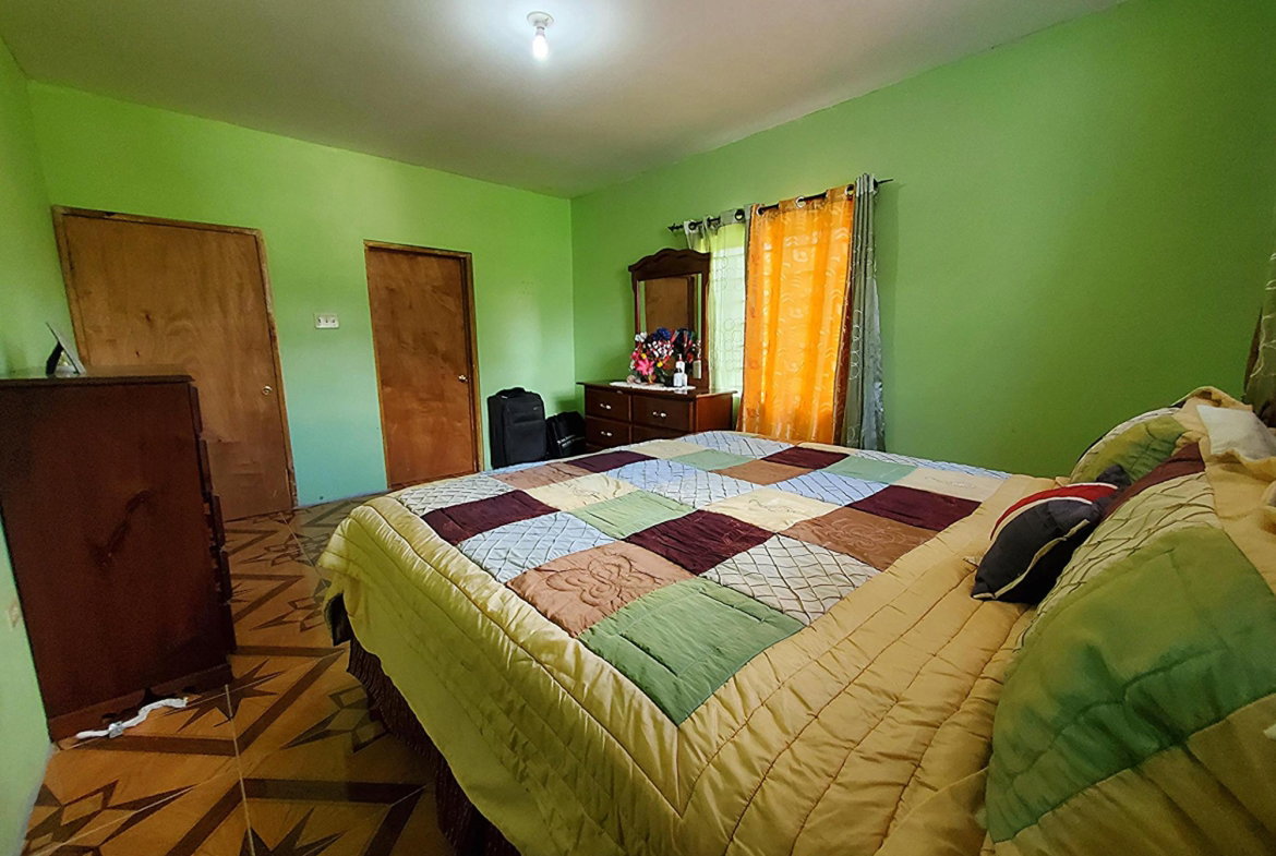 Tenth image of East Ingleside Road in East Ingleside Gaedens, Manchester, Jamaica - property is For Sale