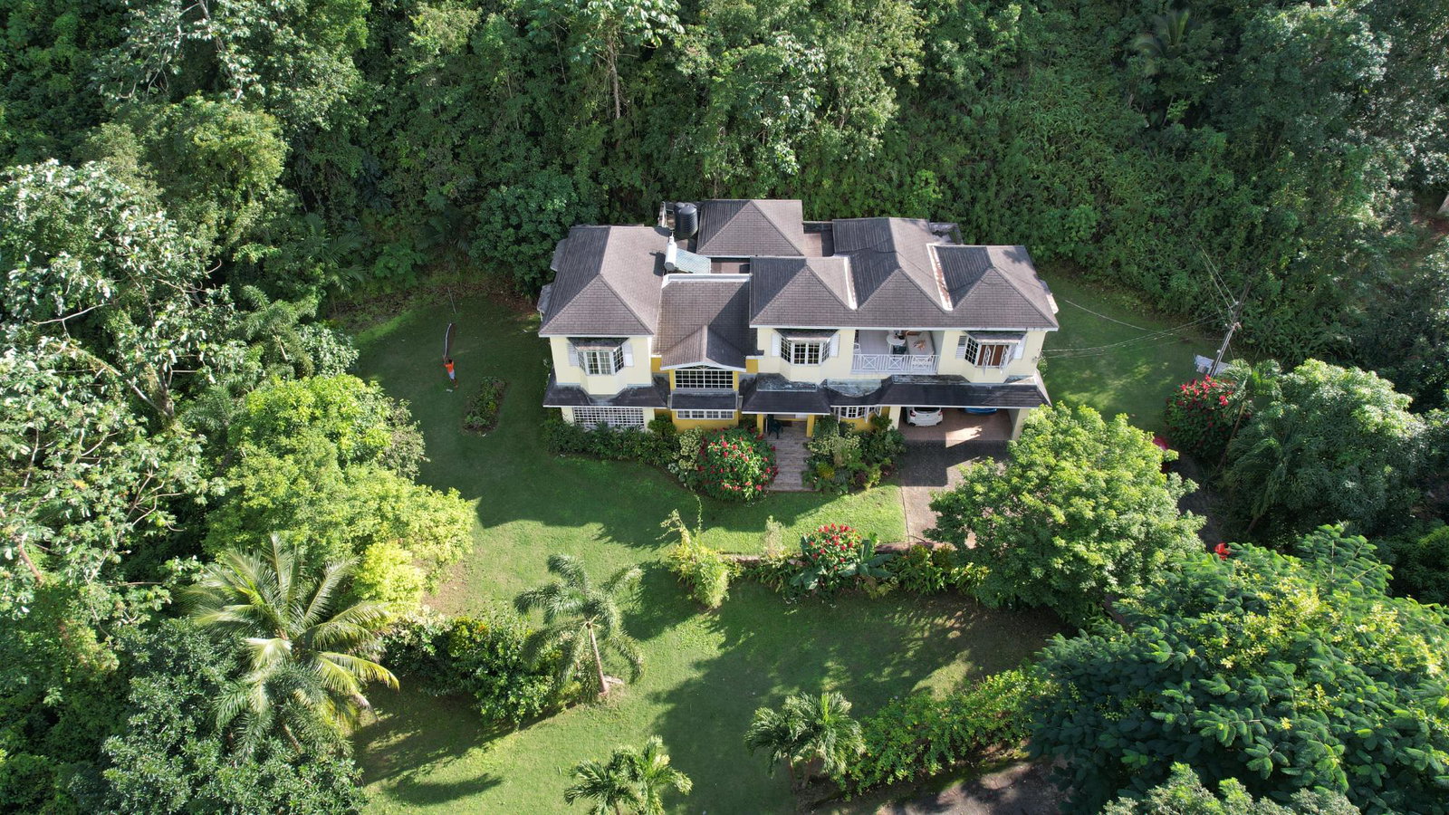 Stunning-Self-Sufficient-Home-for-Sale-in-Woodland-Heights-Jamaica Second image of Woodland Heights, Red Hil in Kingston 19, St. Andrew, Jamaica - property is For Sale