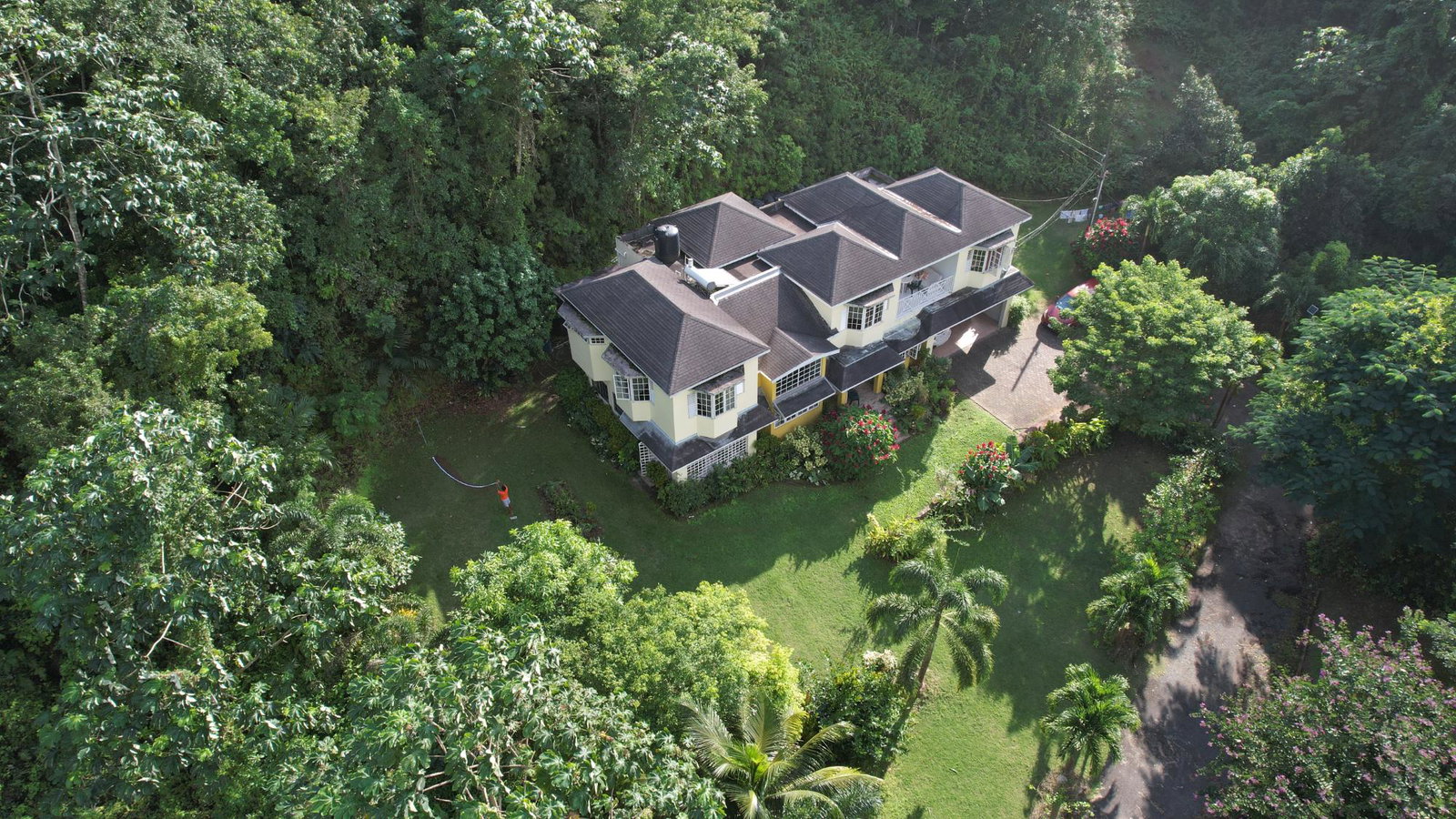 Stunning-Self-Sufficient-Home-for-Sale-in-Woodland-Heights-Jamaica Third image of Woodland Heights, Red Hil in Kingston 19, St. Andrew, Jamaica - property is For Sale