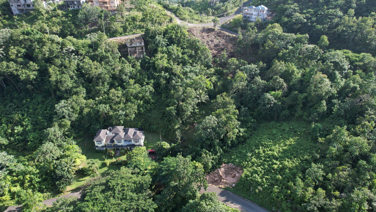 Stunning-Self-Sufficient-Home-for-Sale-in-Woodland-Heights-Jamaica Sixth image of Woodland Heights, Red Hil in Kingston 19, St. Andrew, Jamaica - property is For Sale