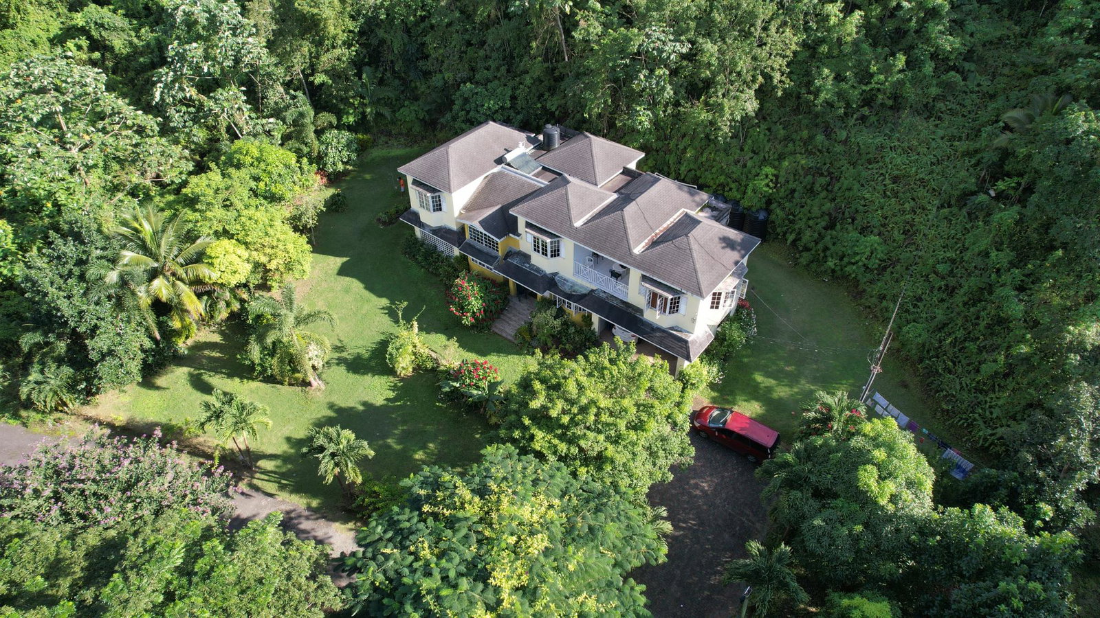 Stunning-Self-Sufficient-Home-for-Sale-in-Woodland-Heights-Jamaica First image of Woodland Heights, Red Hil in Kingston 19, St. Andrew, Jamaica - property is For Sale