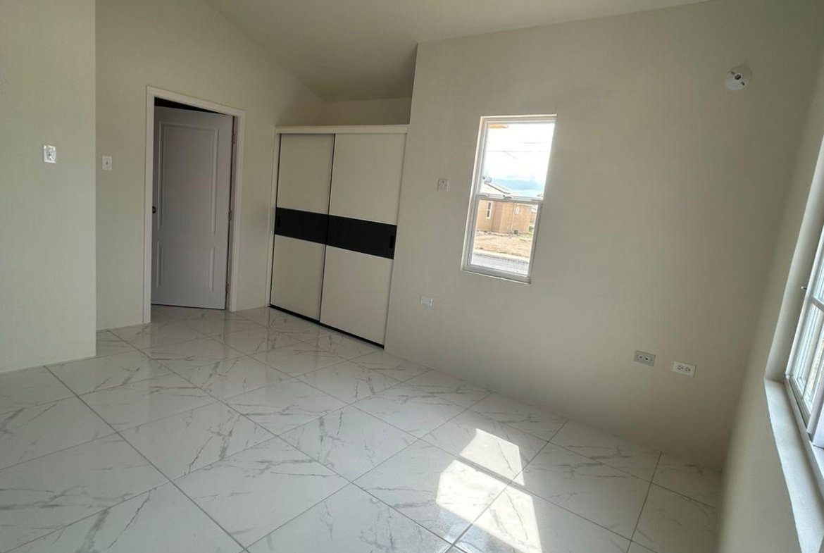 Second image of 889- Phoenix Park Village 2 in Phoenix Park, St. Catherine, Jamaica - property is For Rent