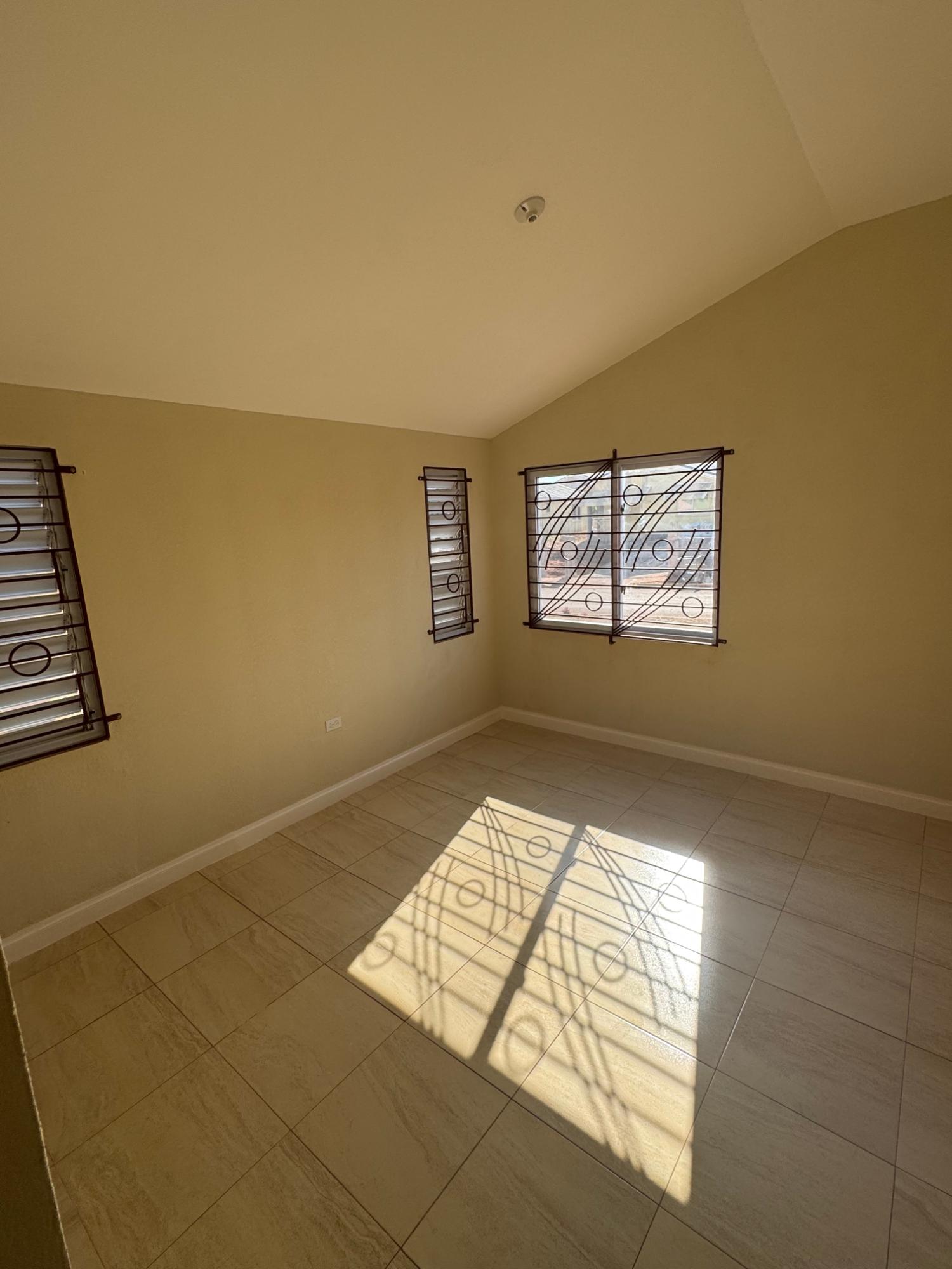 Charming-2-Bed-House-for-Rent-in-St.-Catherine-Jamaica-100000month Sixth image of Lot 1054 Vermont Silver Sun Estate in Innswood, St. Catherine, Jamaica - property is For Rent