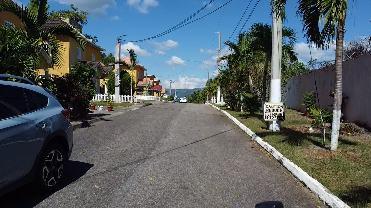 Charming-2-Bedroom-Townhouse-for-Sale-in-Gated-Community-Manchester-Jamaica Second image of 17 Royal View Manor, New Gre in Mandeville, Manchester, Jamaica - property is For Sale