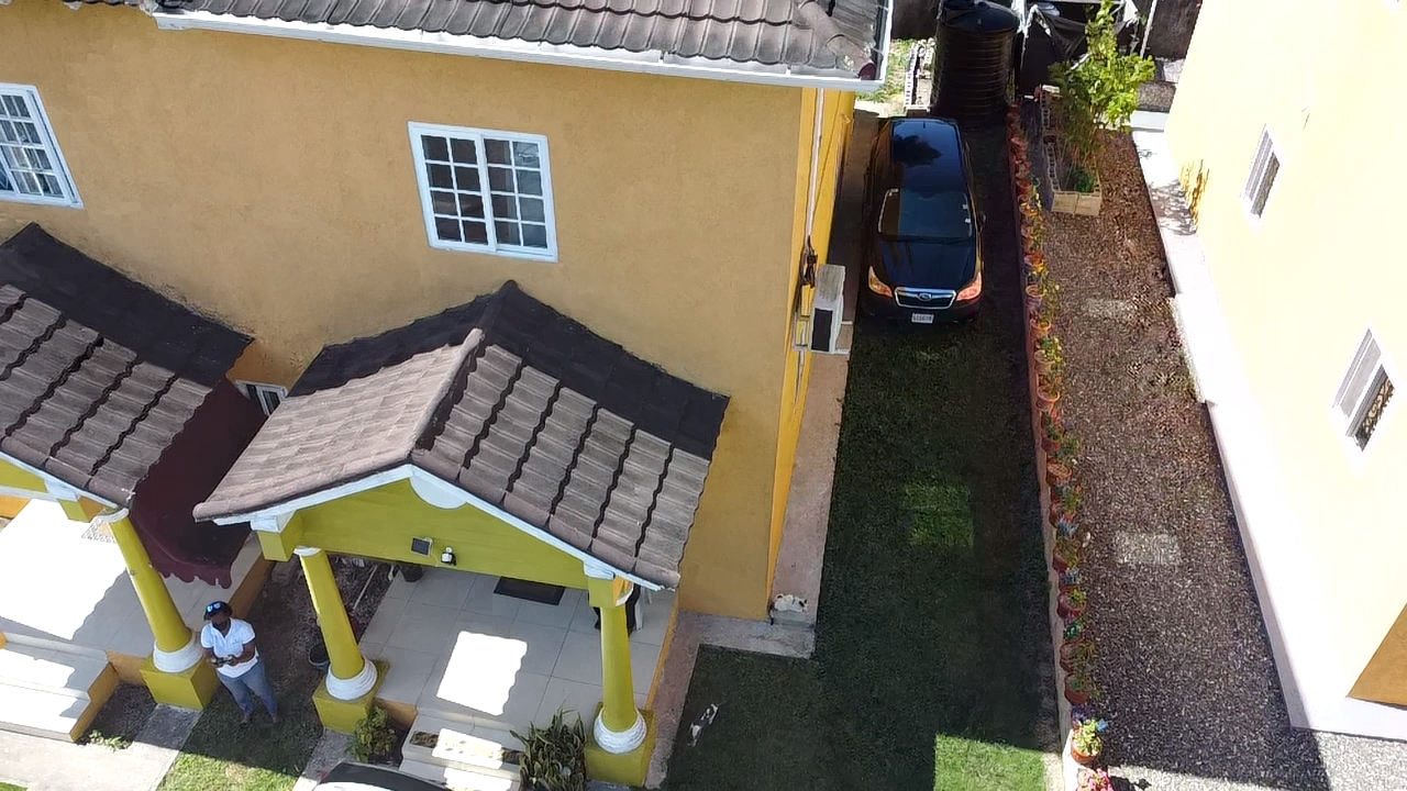 Charming-2-Bedroom-Townhouse-for-Sale-in-Gated-Community-Manchester-Jamaica Fourth image of 17 Royal View Manor, New Gre in Mandeville, Manchester, Jamaica - property is For Sale