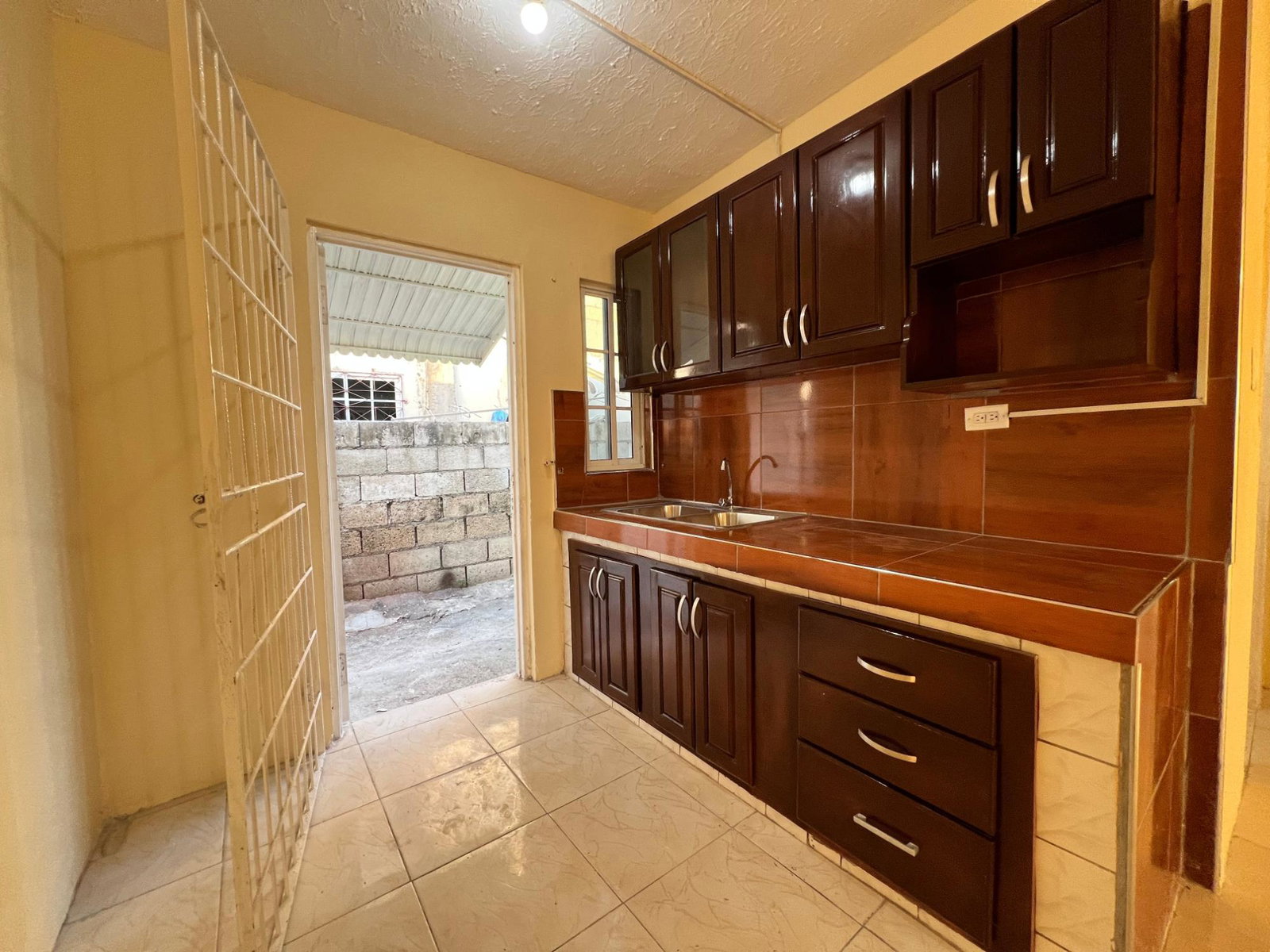 Charming-4-Bedroom-Home-for-Rent-in-Mineral-Heights-Jamaica Fourteenth image of Lot 317- Sulphur Close, Mineral he in Mineral Heights, Clarendon, Jamaica - property is For Rent