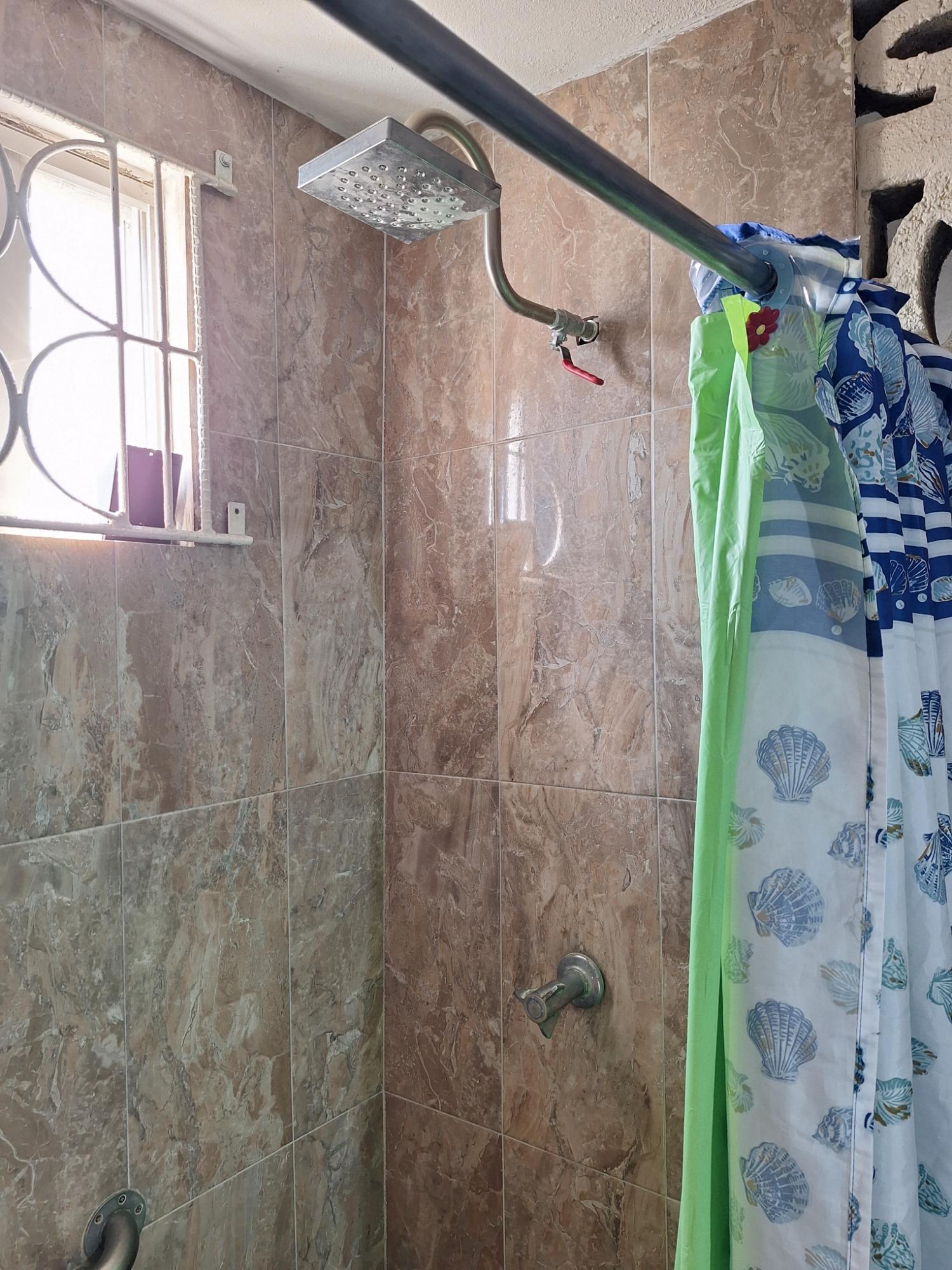 Charming-House-for-Sale-in-Portmore-St.-Catherine-Ideal-for-Families-Investors Eleventh image of 2003- Wakefield Road in WATERHOUSE MOUNTIAN, St. Catherine, Jamaica - property is For Sale