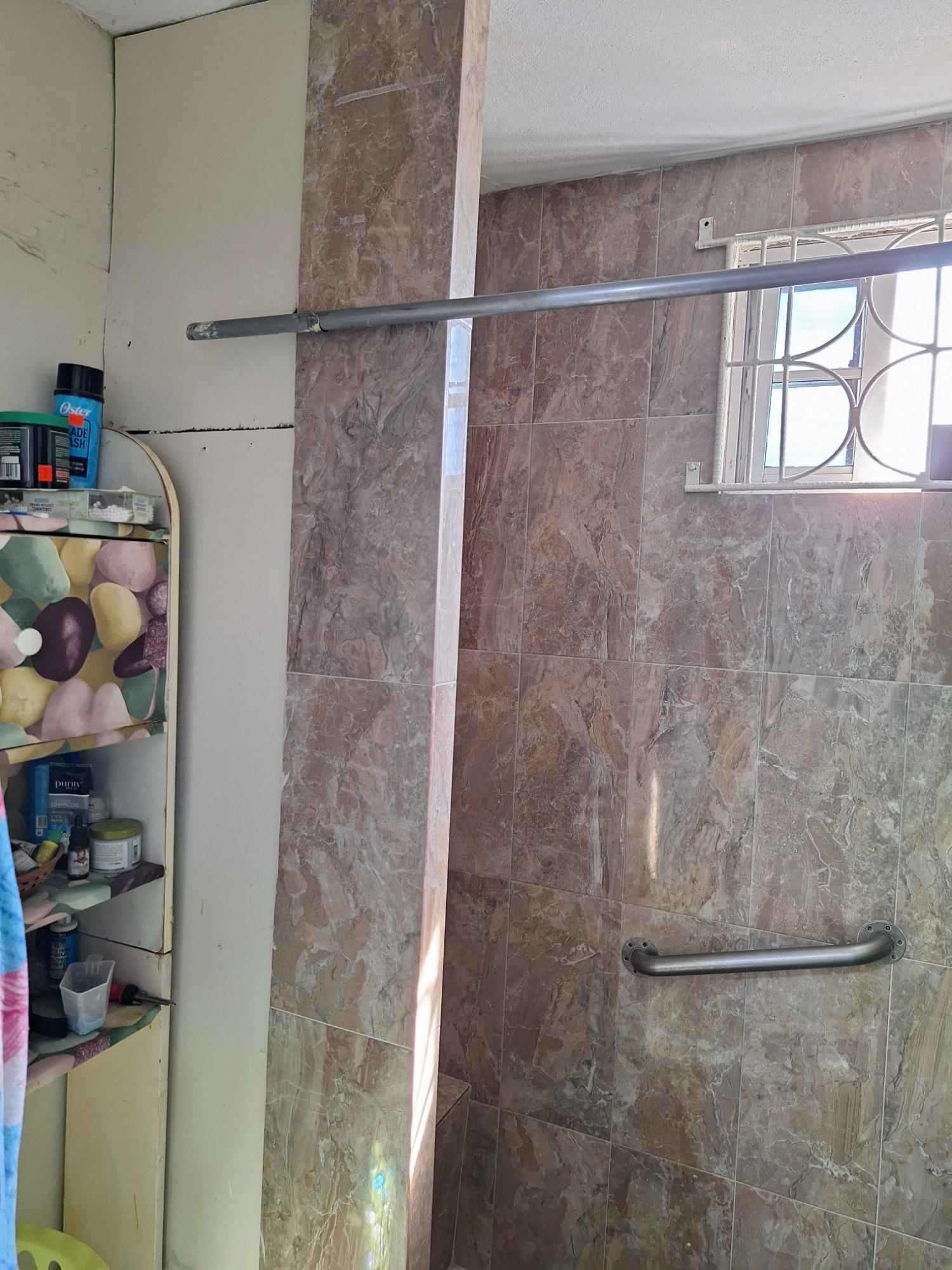 Charming-House-for-Sale-in-Portmore-St.-Catherine-Ideal-for-Families-Investors Thirteenth image of 2003- Wakefield Road in WATERHOUSE MOUNTIAN, St. Catherine, Jamaica - property is For Sale