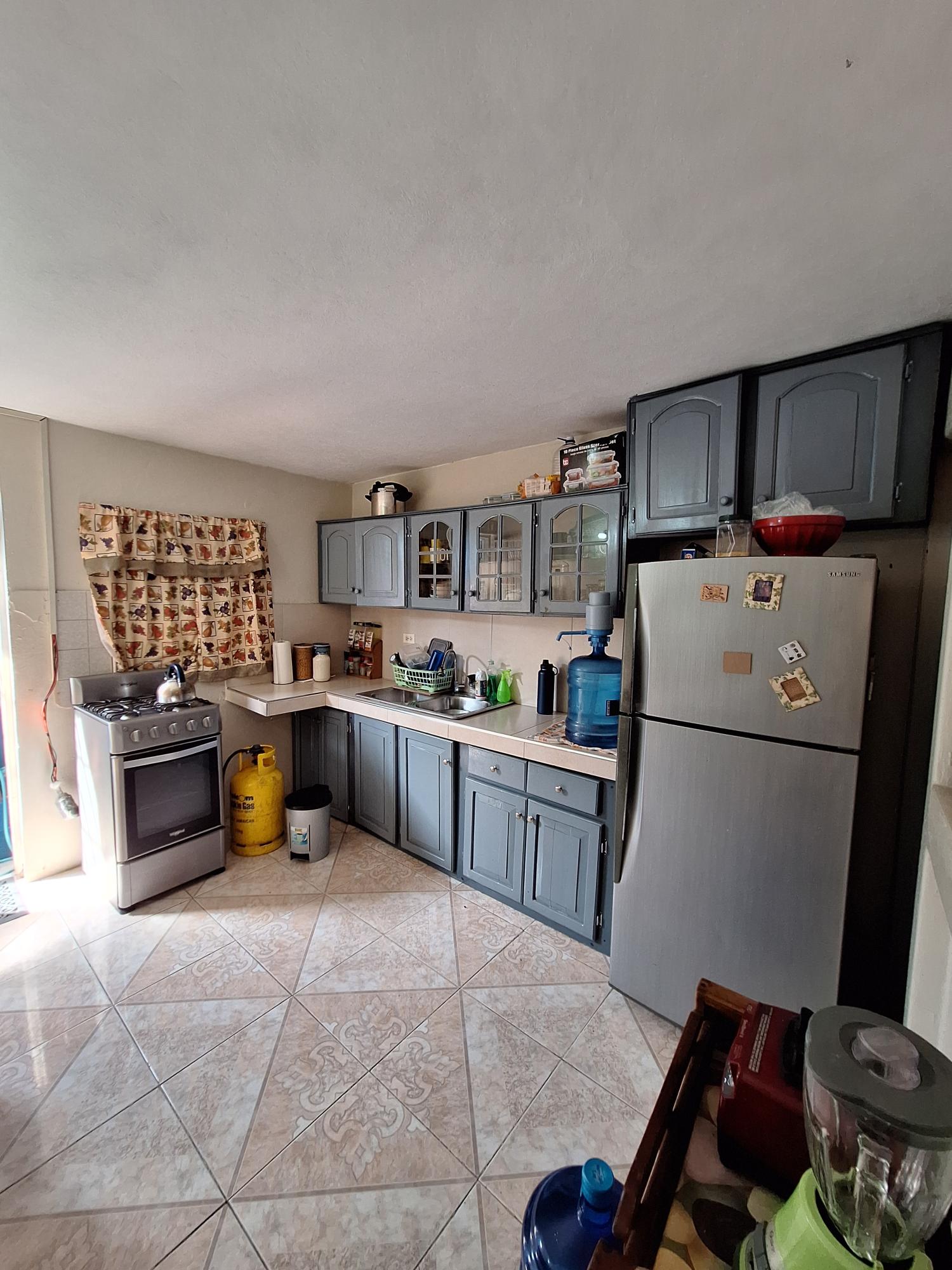 Charming-House-for-Sale-in-Portmore-St.-Catherine-Ideal-for-Families-Investors Sixteenth image of 2003- Wakefield Road in WATERHOUSE MOUNTIAN, St. Catherine, Jamaica - property is For Sale