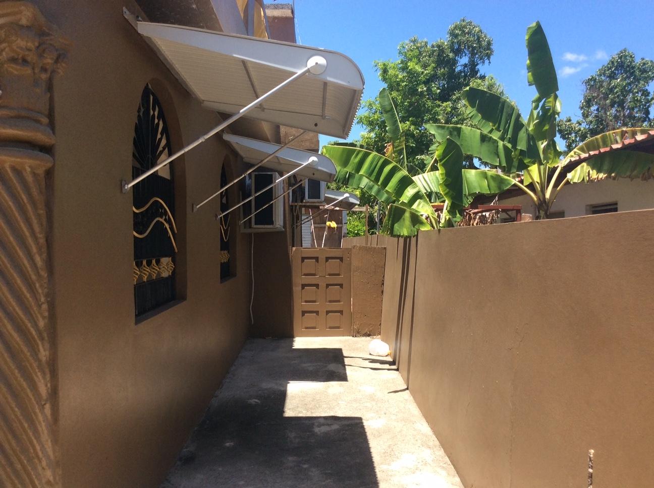 Income-Earning-4-Bedroom-Home-for-Sale-in-St.-Catherine-Jamaica Fifth image of 84 Maho Ave Nightengale Bush in Gutters, St. Catherine, Jamaica - property is For Sale