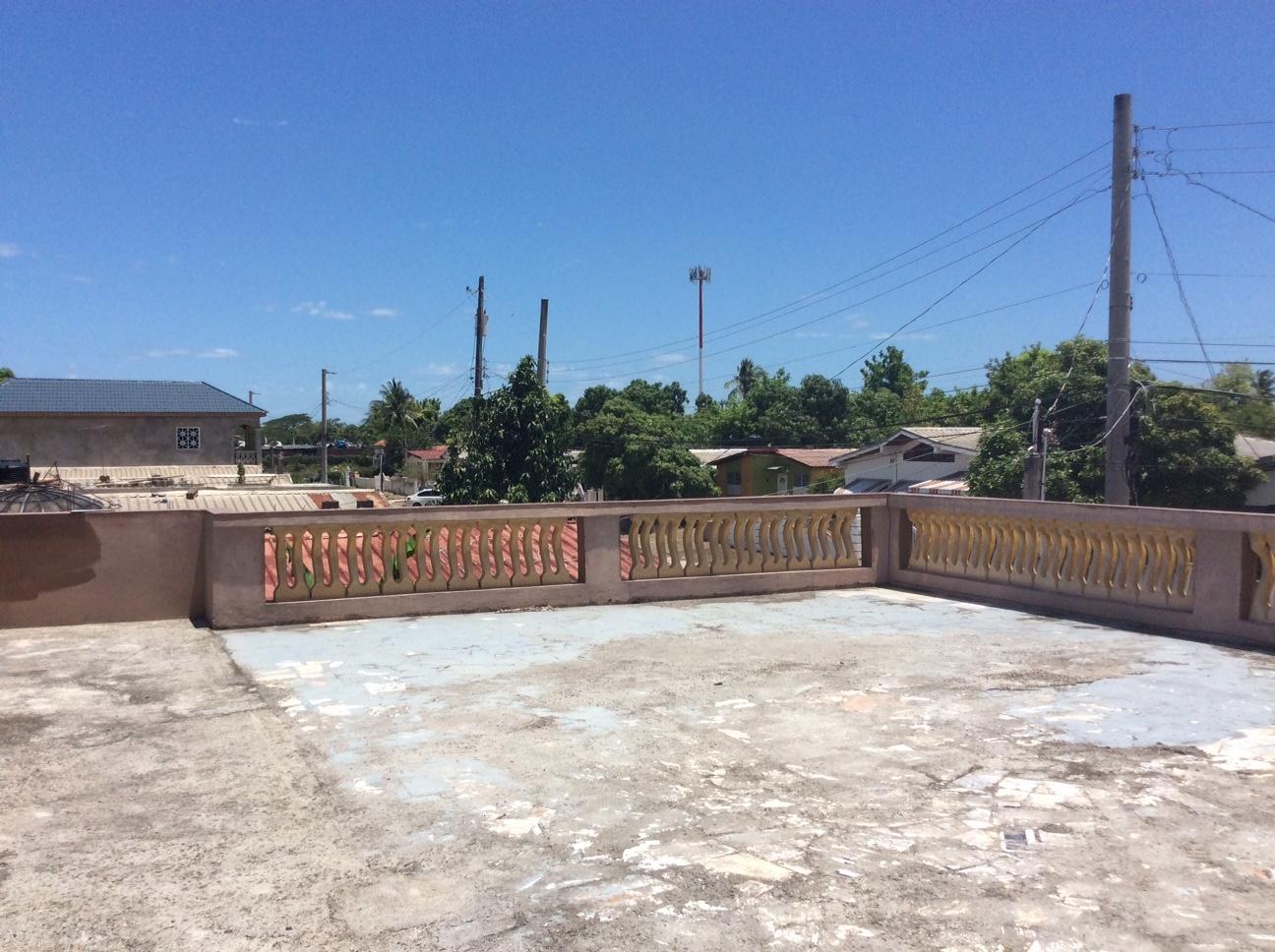 Income-Earning-4-Bedroom-Home-for-Sale-in-St.-Catherine-Jamaica Sixth image of 84 Maho Ave Nightengale Bush in Gutters, St. Catherine, Jamaica - property is For Sale