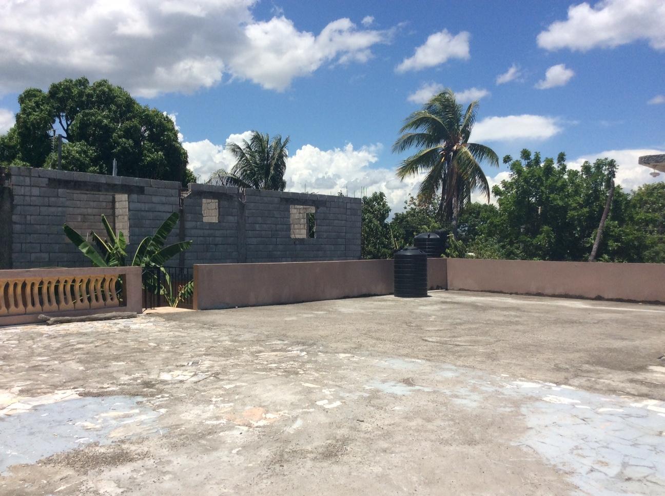 Income-Earning-4-Bedroom-Home-for-Sale-in-St.-Catherine-Jamaica Seventh image of 84 Maho Ave Nightengale Bush in Gutters, St. Catherine, Jamaica - property is For Sale