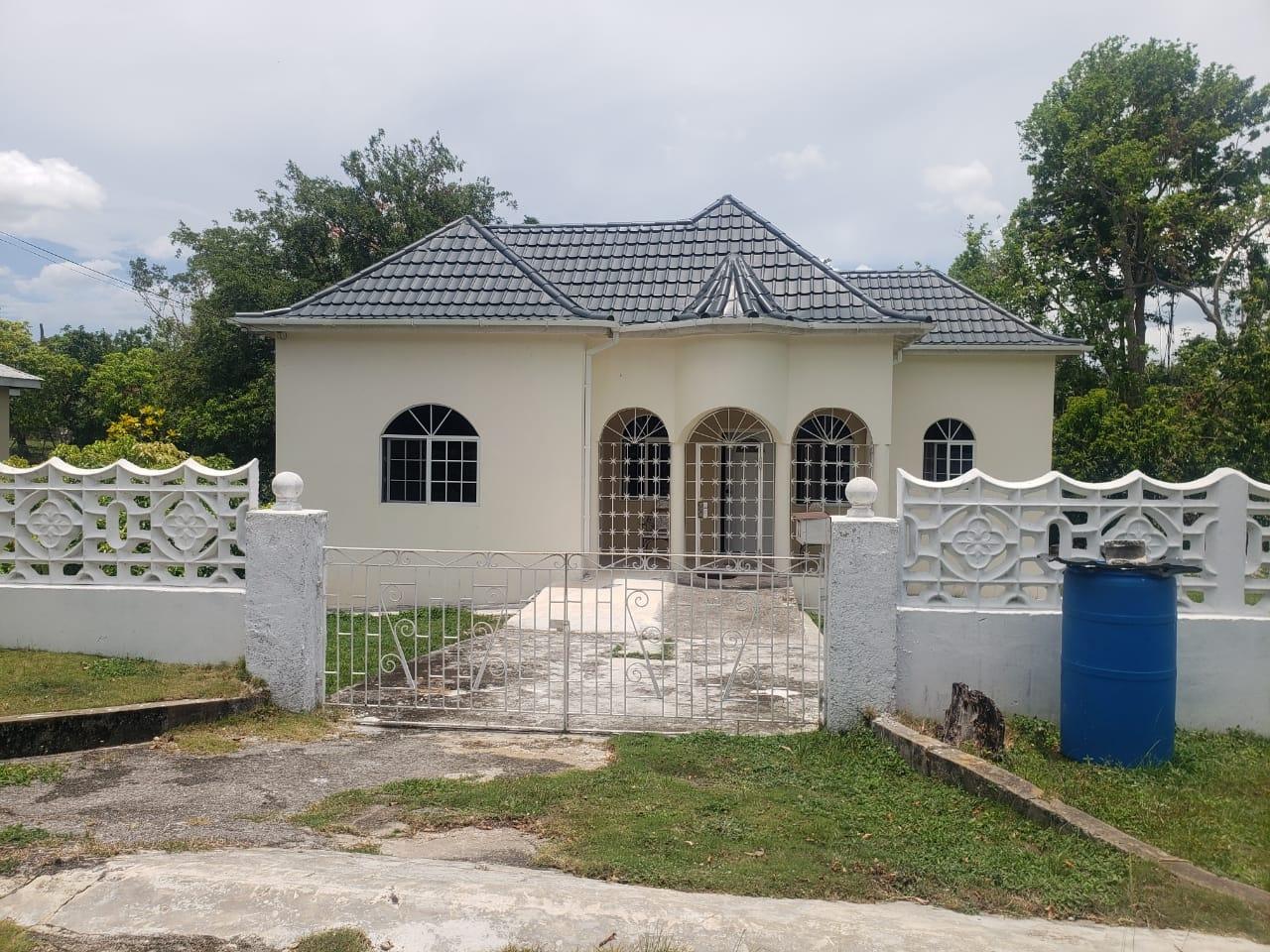 Modern-2-Bedroom-House-for-Sale-in-Glencoe-Santa-Cruz First image of 65 Orchid Close in Santa Cruz, St. Elizabeth, Jamaica - property is For Sale