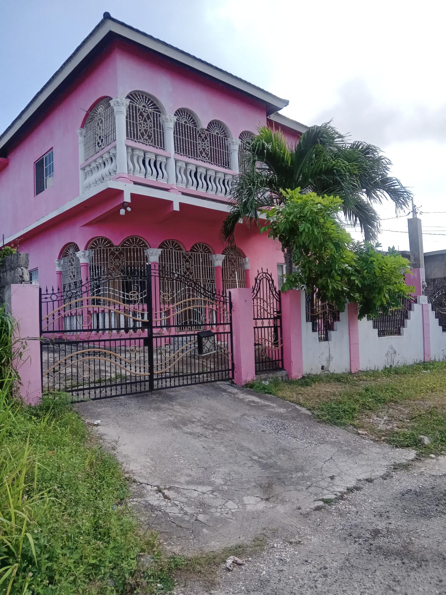 Spacious-Two-Story-Home-in-Sydenham-Villa-Jamaica-Ideal-for-Multi-Family-Living Second image of 399 Syndenham Villa in Spanish Town, St. Catherine, Jamaica - property is For Sale