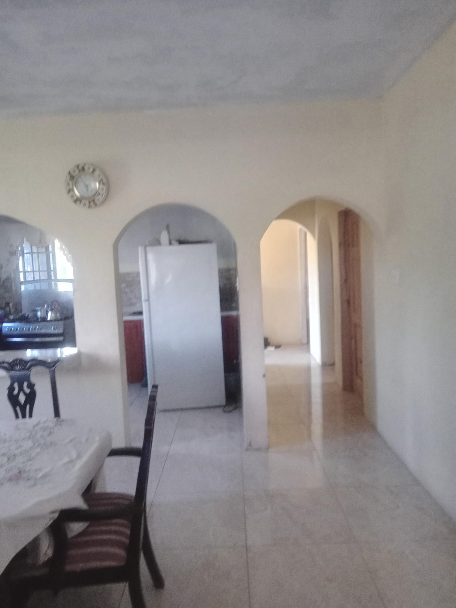 Spacious-Two-Story-Home-in-Sydenham-Villa-Jamaica-Ideal-for-Multi-Family-Living Sixth image of 399 Syndenham Villa in Spanish Town, St. Catherine, Jamaica - property is For Sale