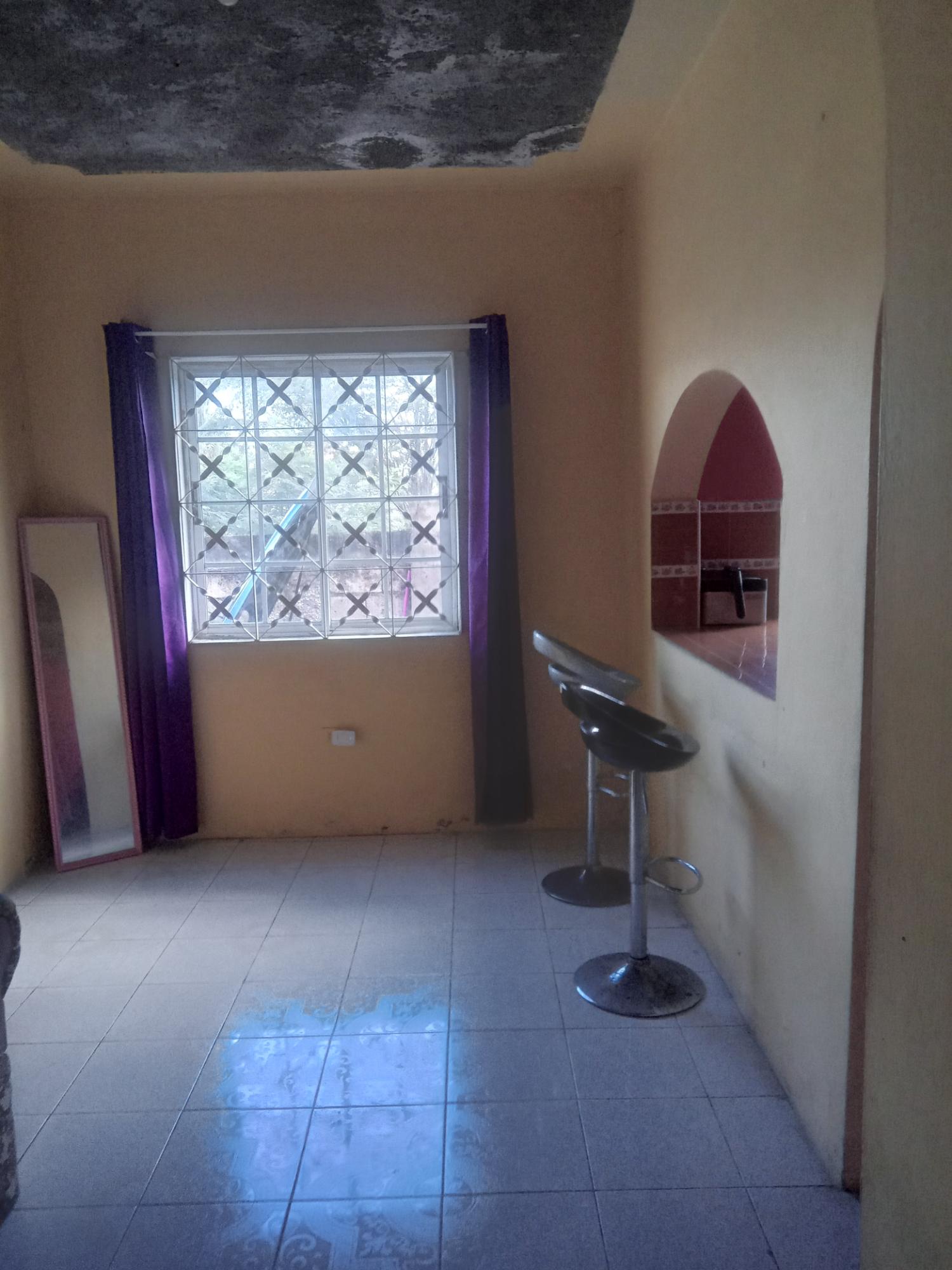 Spacious-Two-Story-Home-in-Sydenham-Villa-Jamaica-Ideal-for-Multi-Family-Living Tenth image of 399 Syndenham Villa in Spanish Town, St. Catherine, Jamaica - property is For Sale