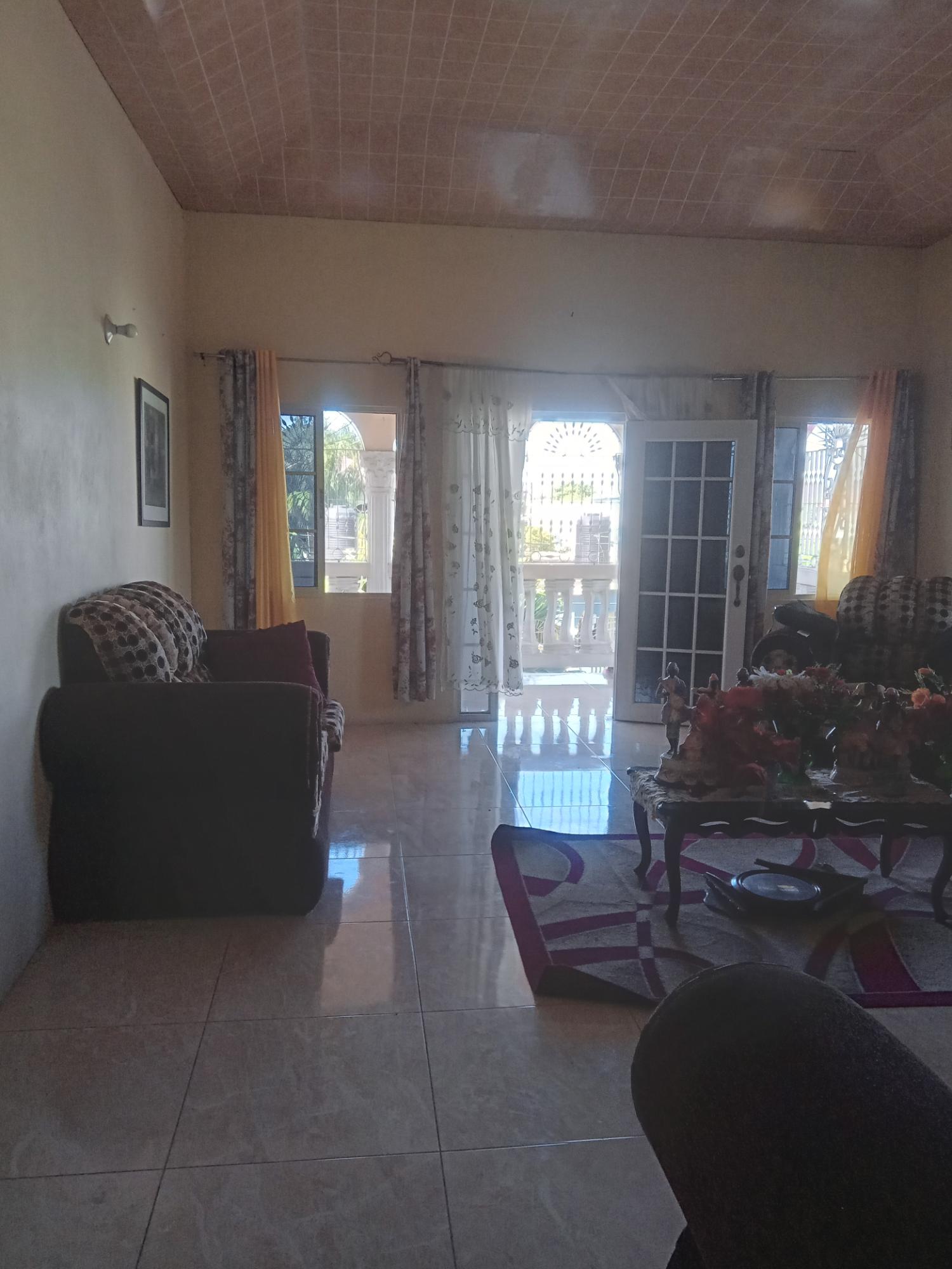 Spacious-Two-Story-Home-in-Sydenham-Villa-Jamaica-Ideal-for-Multi-Family-Living First image of 399 Syndenham Villa in Spanish Town, St. Catherine, Jamaica - property is For Sale