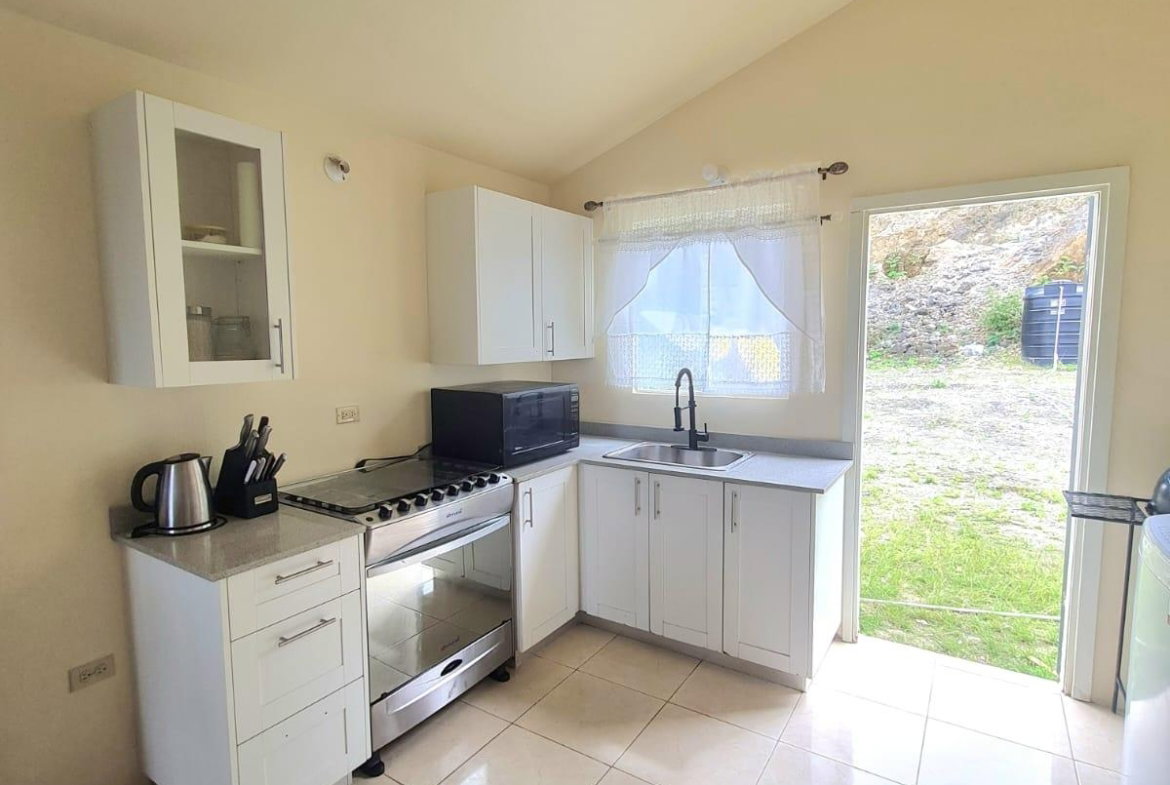 Fourth image of 1037 Montego West Village in Granville, St. James, Jamaica - property is For Rent