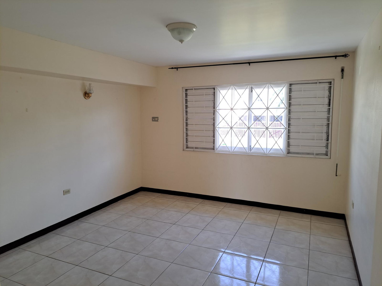 Charming-2-Bedroom-Townhouse-for-Rent-in-Charlton-Manor-St.-Andrew Thirteenth image of 4 Brickell Mews in Kingston 8, St. Andrew, Jamaica - property is For Rent