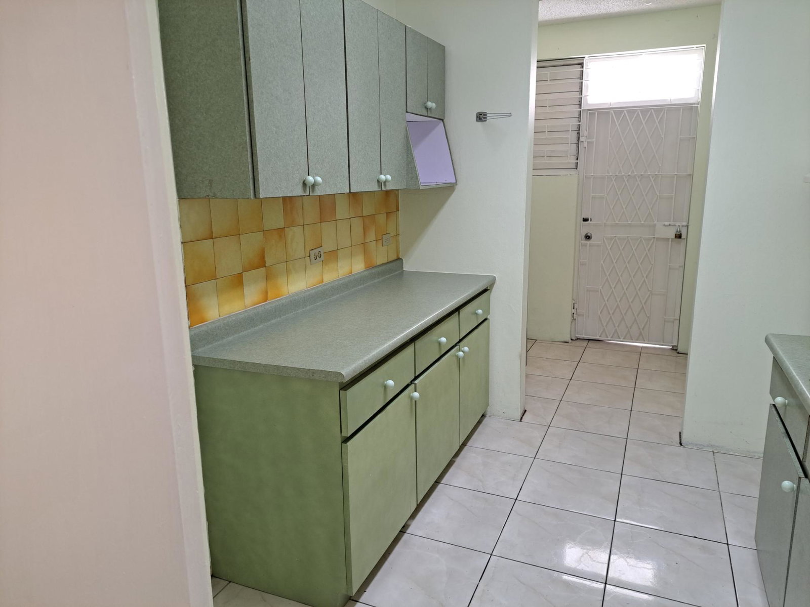 Charming-2-Bedroom-Townhouse-for-Rent-in-Charlton-Manor-St.-Andrew Sixth image of 4 Brickell Mews in Kingston 8, St. Andrew, Jamaica - property is For Rent