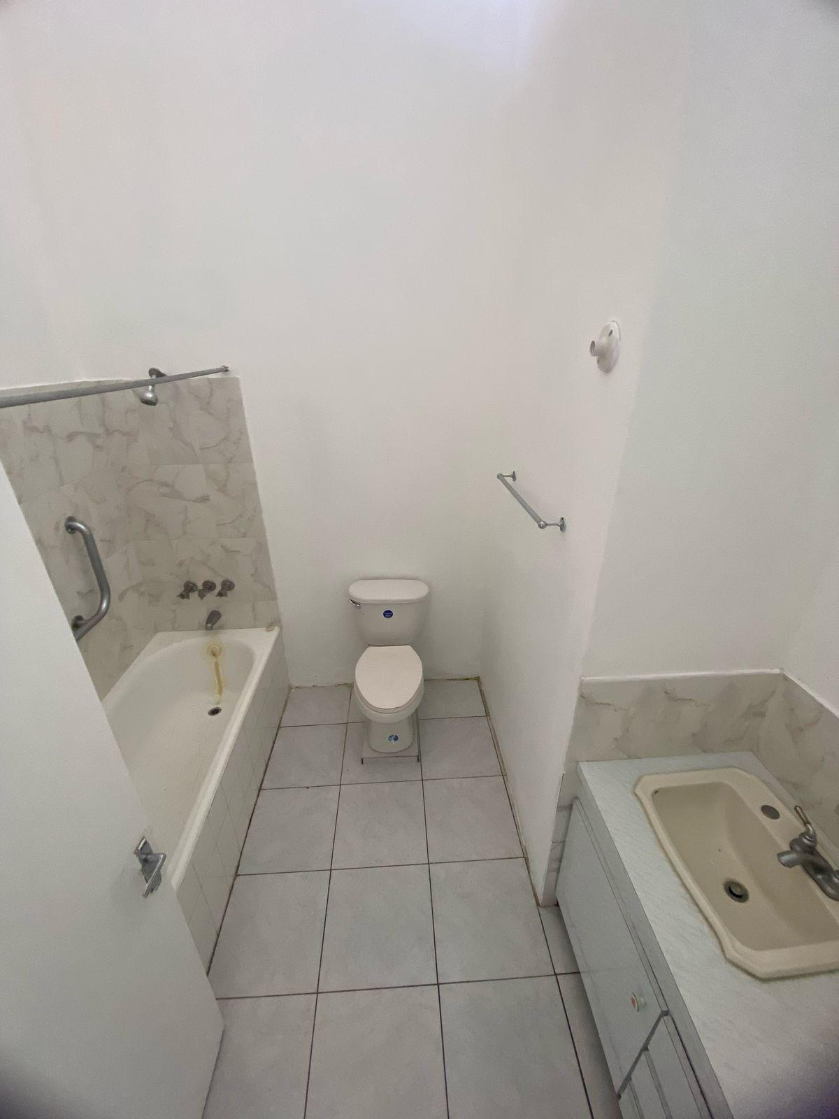 Charming-2-Bedroom-Townhouse-for-Sale-in-Manchester-Jamaica Thirteenth image of 8-5 West Road in Mandeville, Manchester, Jamaica - property is For Sale