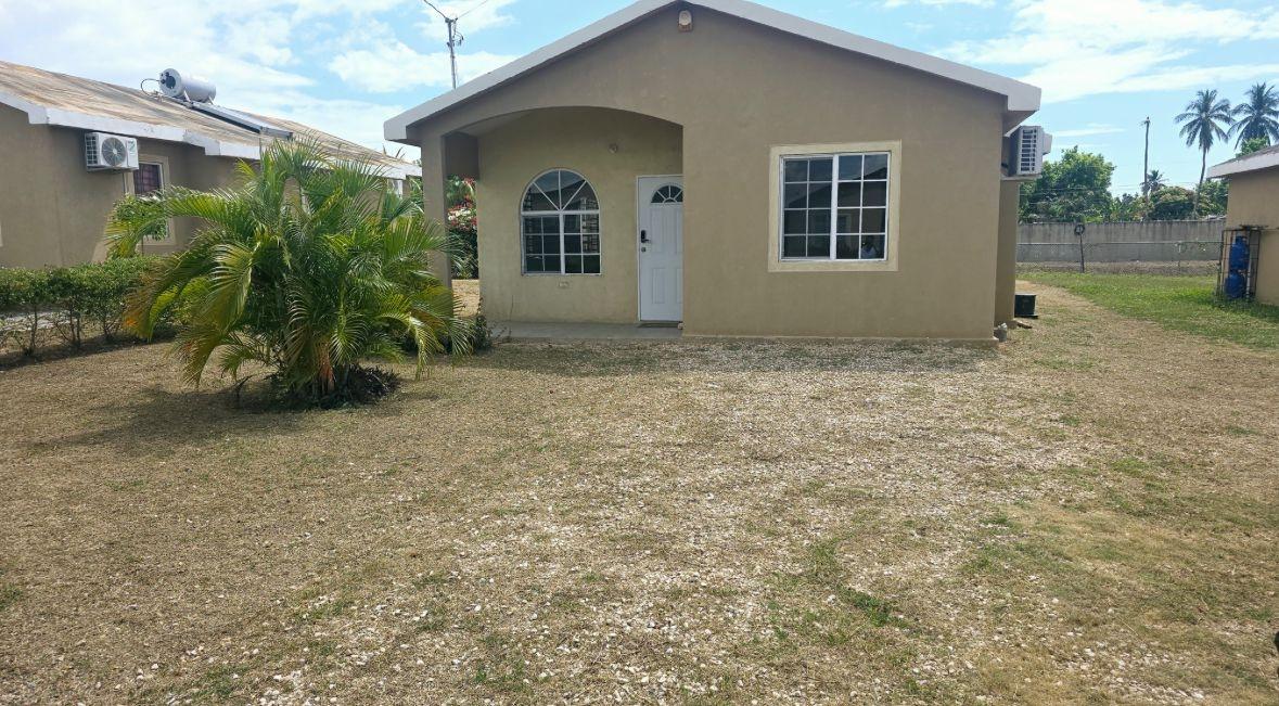 Charming-3-Bedroom-House-for-Rent-in-Gated-Community-643-Lagoon-Avenue-Jamaica First image of 643 Lagoon Avenue in Spanish Town, St. Catherine, Jamaica - property is For Rent