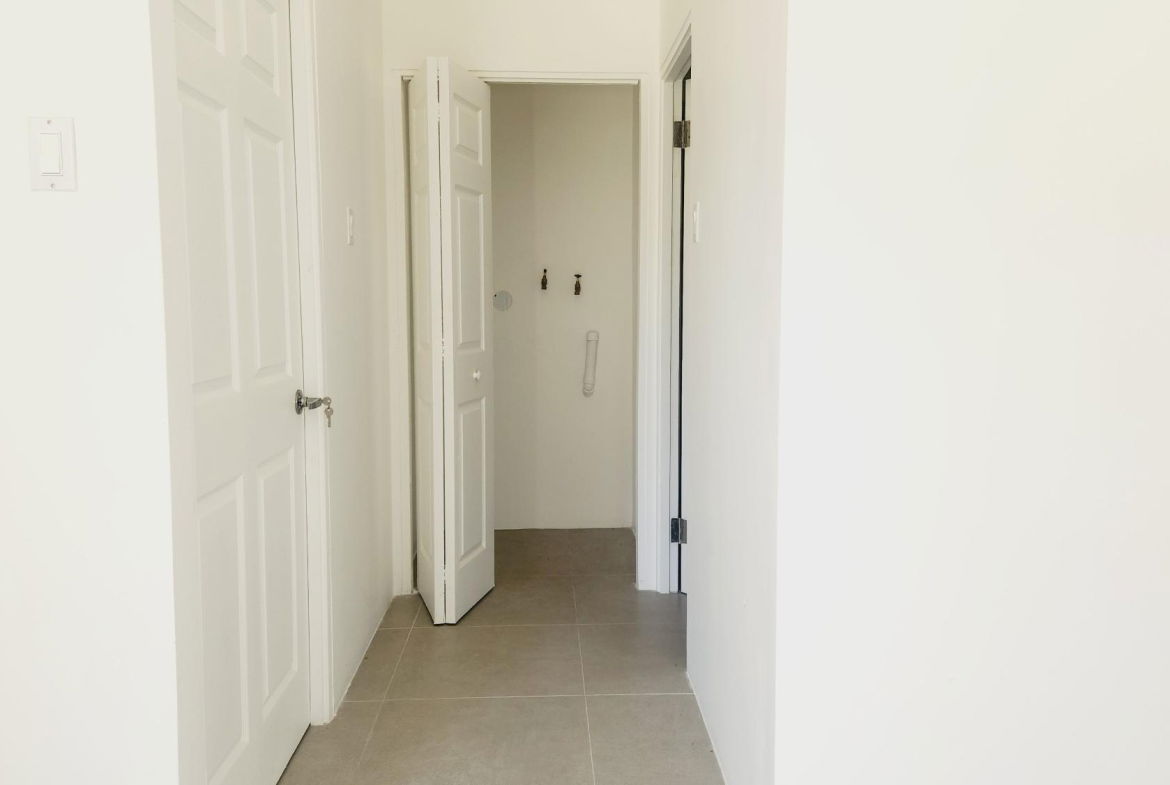 Ground-Floor-Apartment-for-Sale-in-Abia-Kingston-Modern-Amenities Seventeenth image of 32-67 Shortwood Road, Kingston in Kingston 8, St. Andrew, Jamaica - property is For Sale