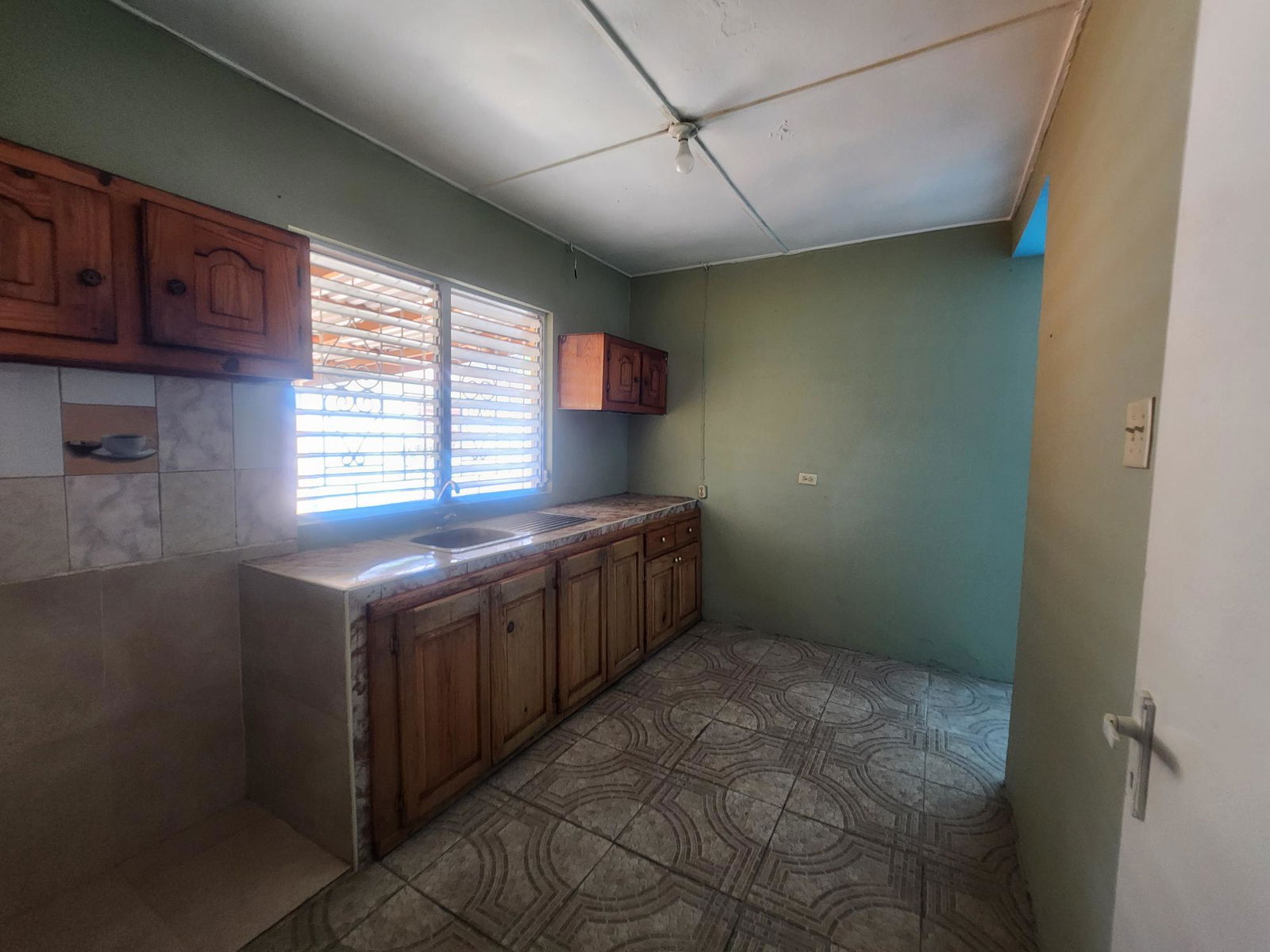 Spacious-3-Bedroom-Home-for-Sale-in-St.-Andrew-Jamaica Thirteenth image of 31 Auburn Avenue in Kingston 20, St. Andrew, Jamaica - property is For Sale