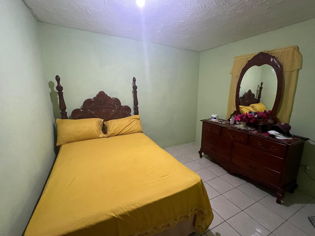 Spacious-4-Bedroom-Home-for-Sale-in-Hayes-Newtown-Clarendon Second image of 331 Palm Avenue, in Hayes Cornpiece, Clarendon, Jamaica - property is For Sale