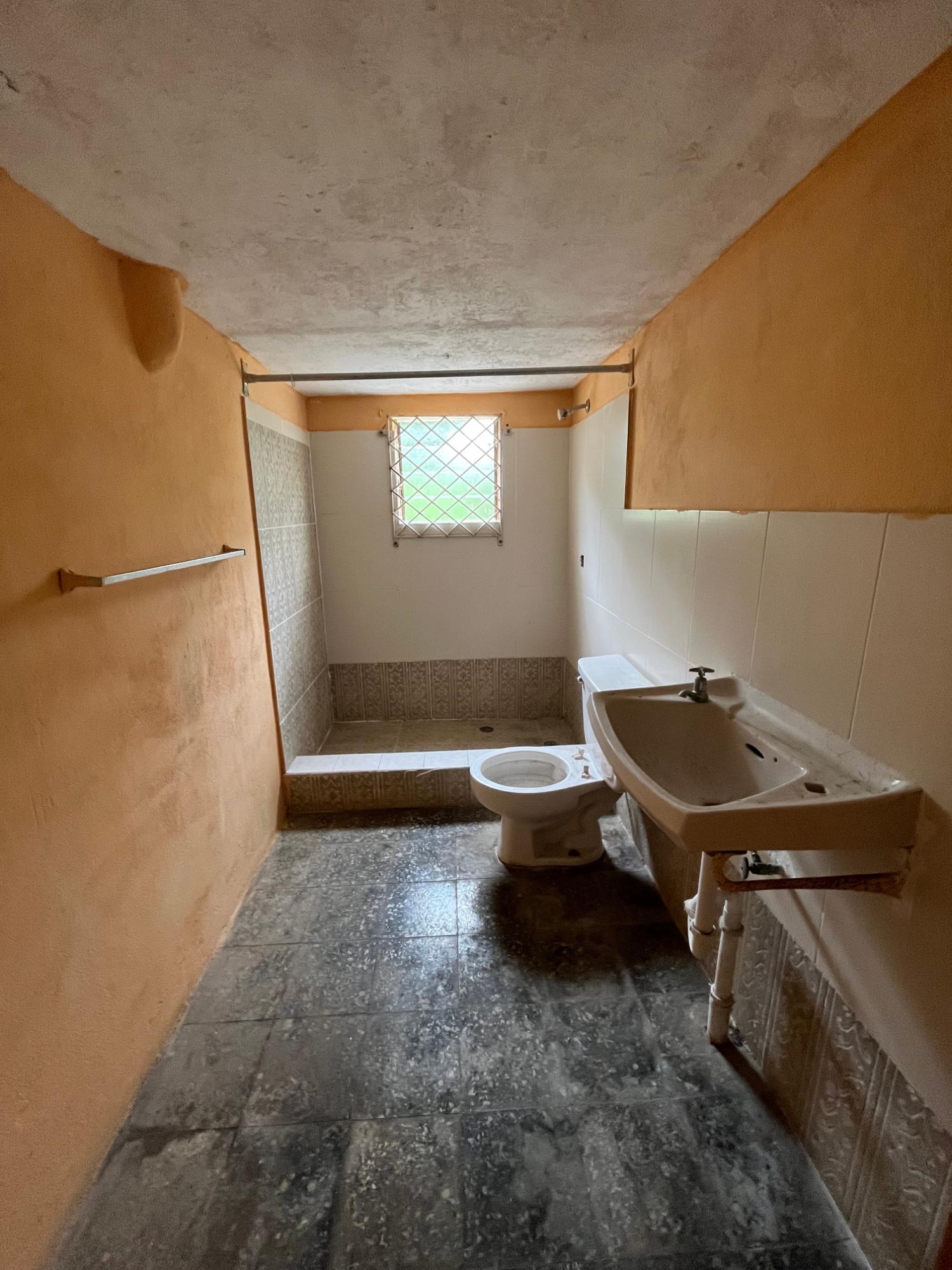 Spacious-6-Bedroom-Family-Home-for-Sale-in-Mandeville-Jamaica Fourteenth image of 4 4 Woodleigh Decarteret ro in Mandeville, Manchester, Jamaica - property is For Sale