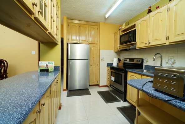 Thirteenth image of 12 Cowper Avenue, College gr in Kingston 6, St. Andrew, Jamaica - property is For Rent