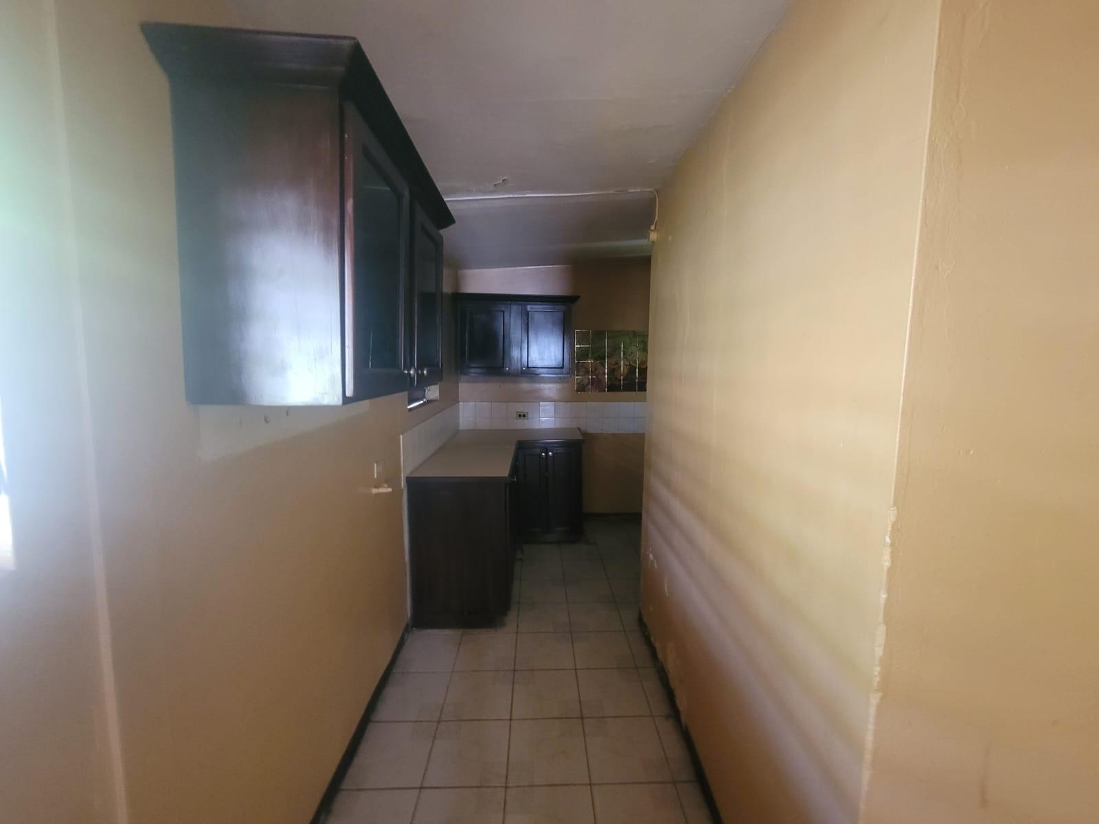 Fixer-Upper-House-for-Sale-in-St.-Andrew-11-Winsome-Avenue Eleventh image of 11 Winsome Avenue in Kingston 19, St. Andrew, Jamaica - property is For Sale