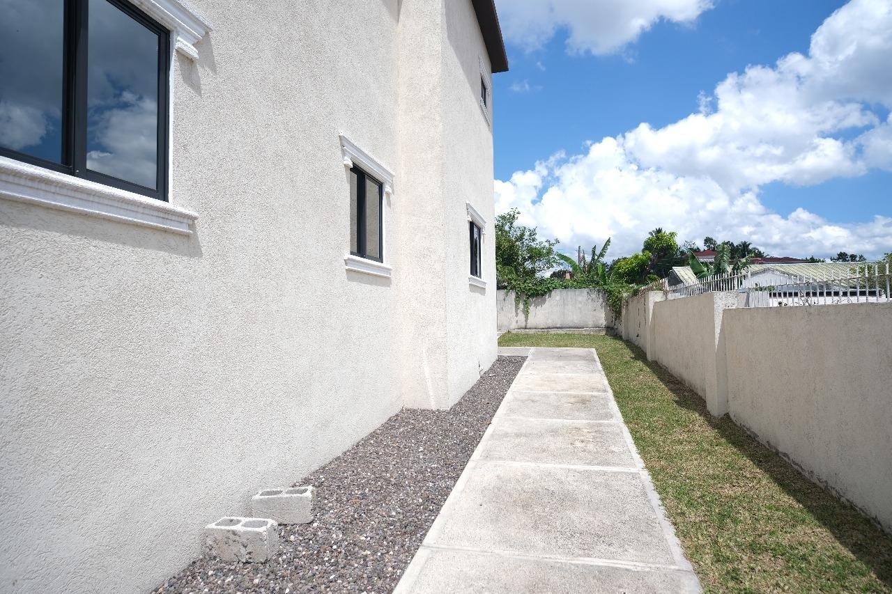Modern-Family-Townhouse-for-Sale-in-Gated-Community-31-Mckinley-Heights-Jamaica Third image of 31 Mckinley Heights in Brumalia, Manchester, Jamaica - property is For Sale