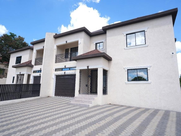 First image of 31 Mckinley Heights in Brumalia, Manchester, Jamaica - property is For Sale