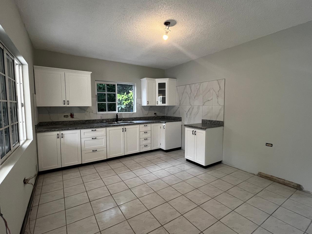 Spacious-1-Bedroom-Apartment-for-Rent-in-Gated-Community-St.-Andrew-Jamaica Third image of Unit 2-85 Happy Grove Road in Kingston 19, St. Andrew, Jamaica - property is For Rent