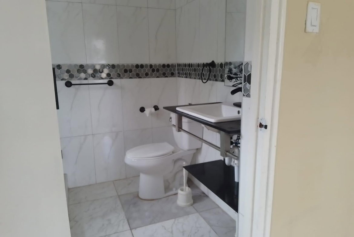 Eighteenth image of 28 Spur Tree Heights in Spur Tree, Manchester, Jamaica - property is For Sale