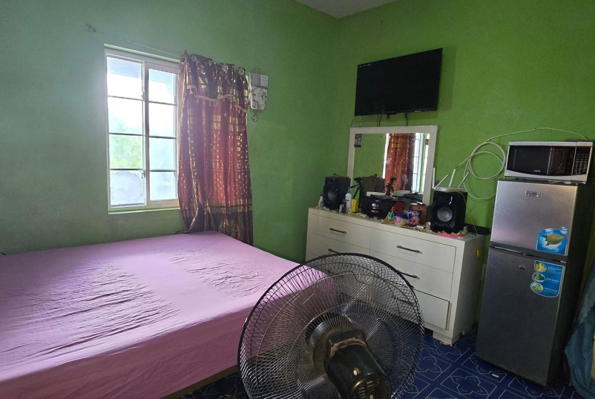Sixth image of 1232-sector r4 Longville Park in Longville Park, Clarendon, Jamaica - property is For Sale