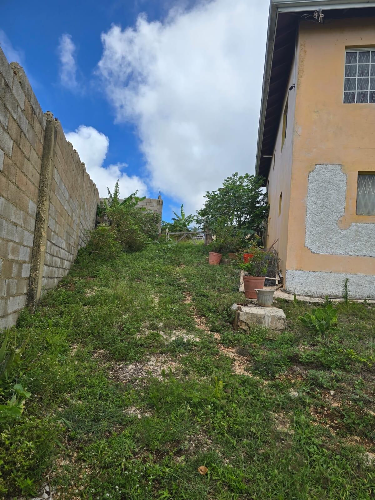 4-Bedroom-Solar-Powered-House-for-Sale-in-Cross-Keys-Manchester-Jamaica Thirteenth image of Cocoa Walk District in Cross Keys, Manchester, Jamaica - property is For Sale