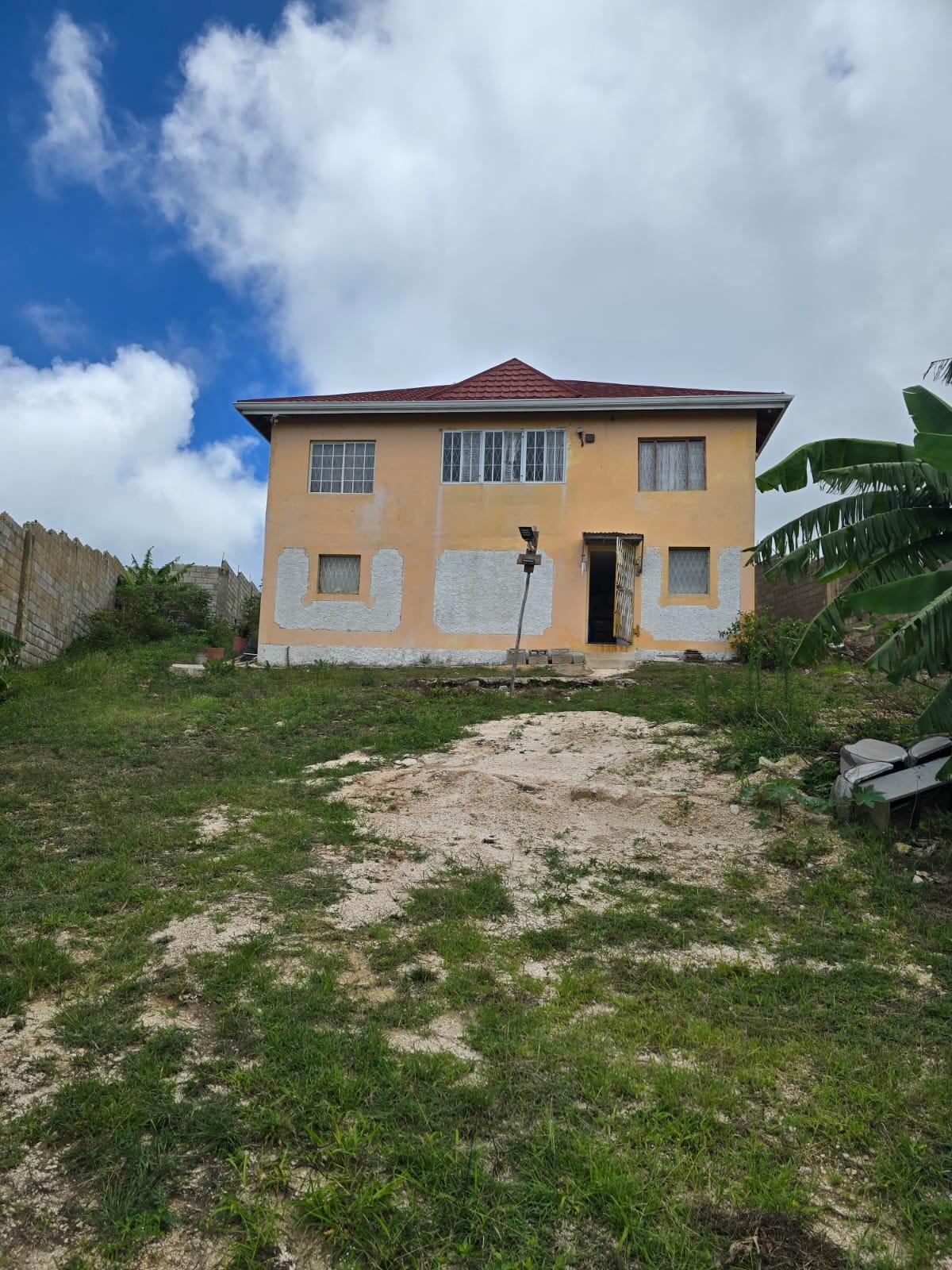 4-Bedroom-Solar-Powered-House-for-Sale-in-Cross-Keys-Manchester-Jamaica Third image of Cocoa Walk District in Cross Keys, Manchester, Jamaica - property is For Sale