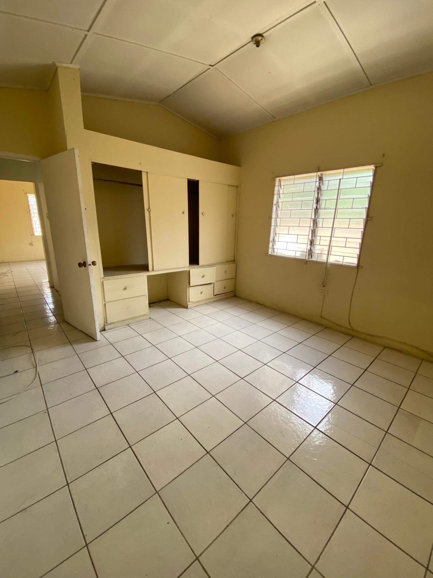 Fixer-Upper-5-Bedroom-House-for-Sale-in-Pembroke-Hall-St.-Andrew-Jamaica Sixth image of 103 Ken Hill Drive in Kingston 20, St. Andrew, Jamaica - property is For Sale