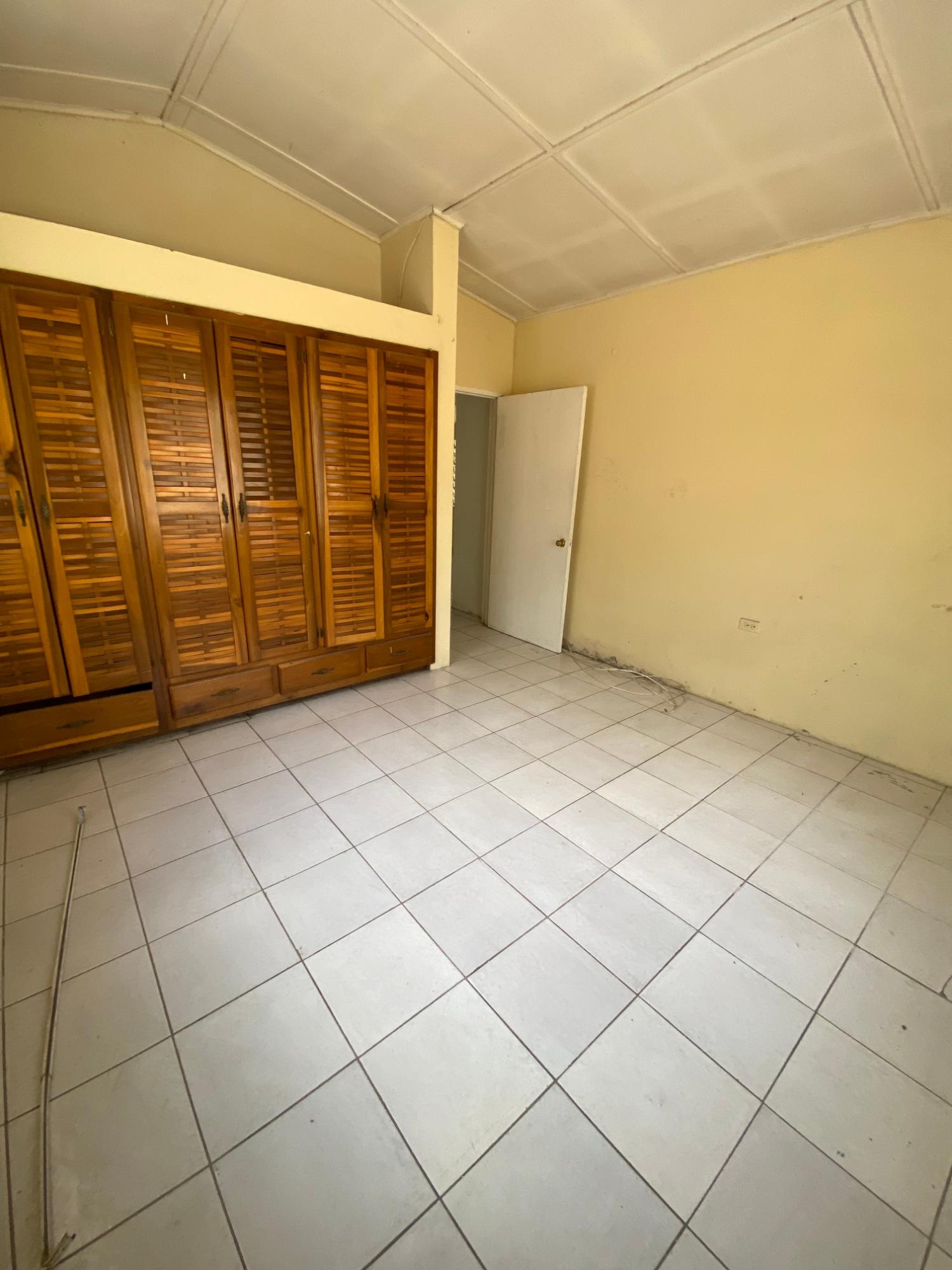 Fixer-Upper-5-Bedroom-House-for-Sale-in-Pembroke-Hall-St.-Andrew-Jamaica Seventh image of 103 Ken Hill Drive in Kingston 20, St. Andrew, Jamaica - property is For Sale